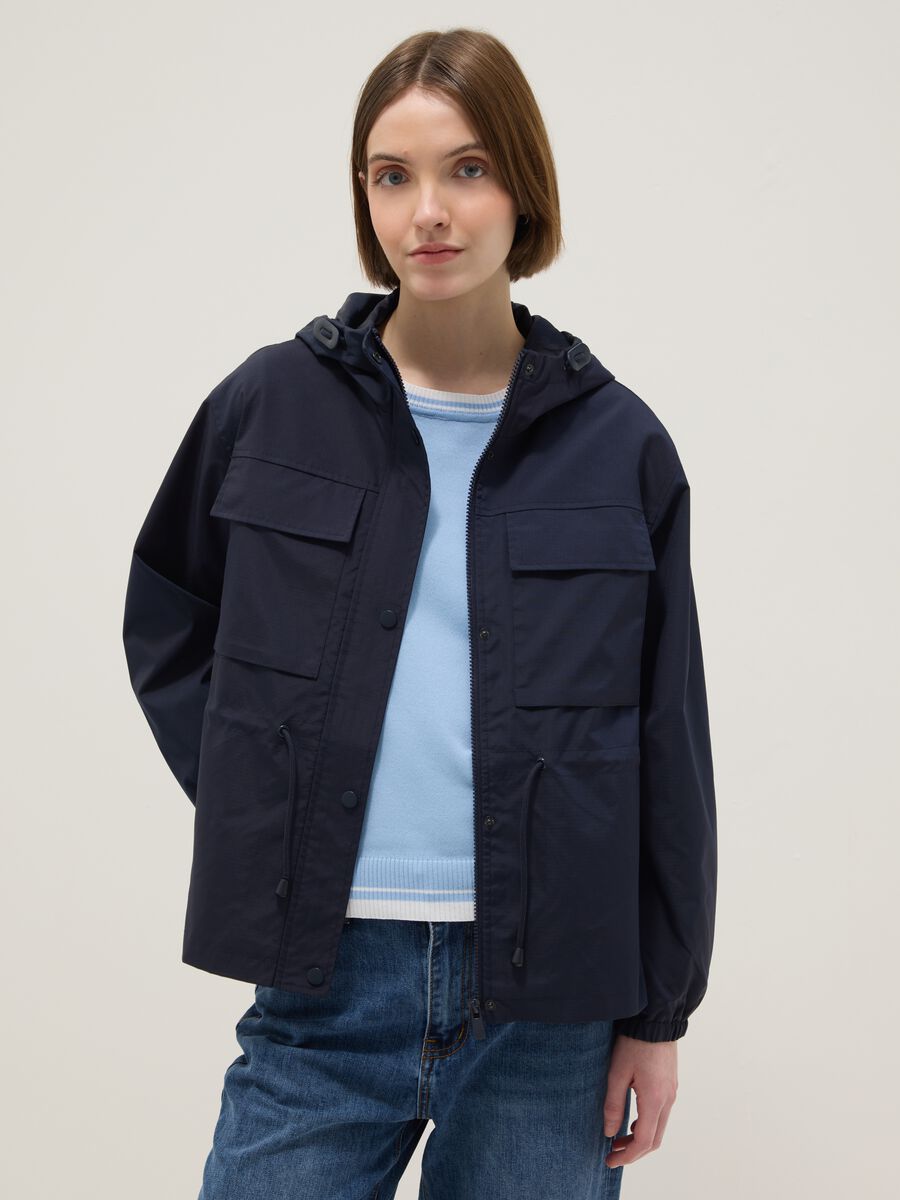 Blue waterproof jacket regular fit with pockets and hood_1