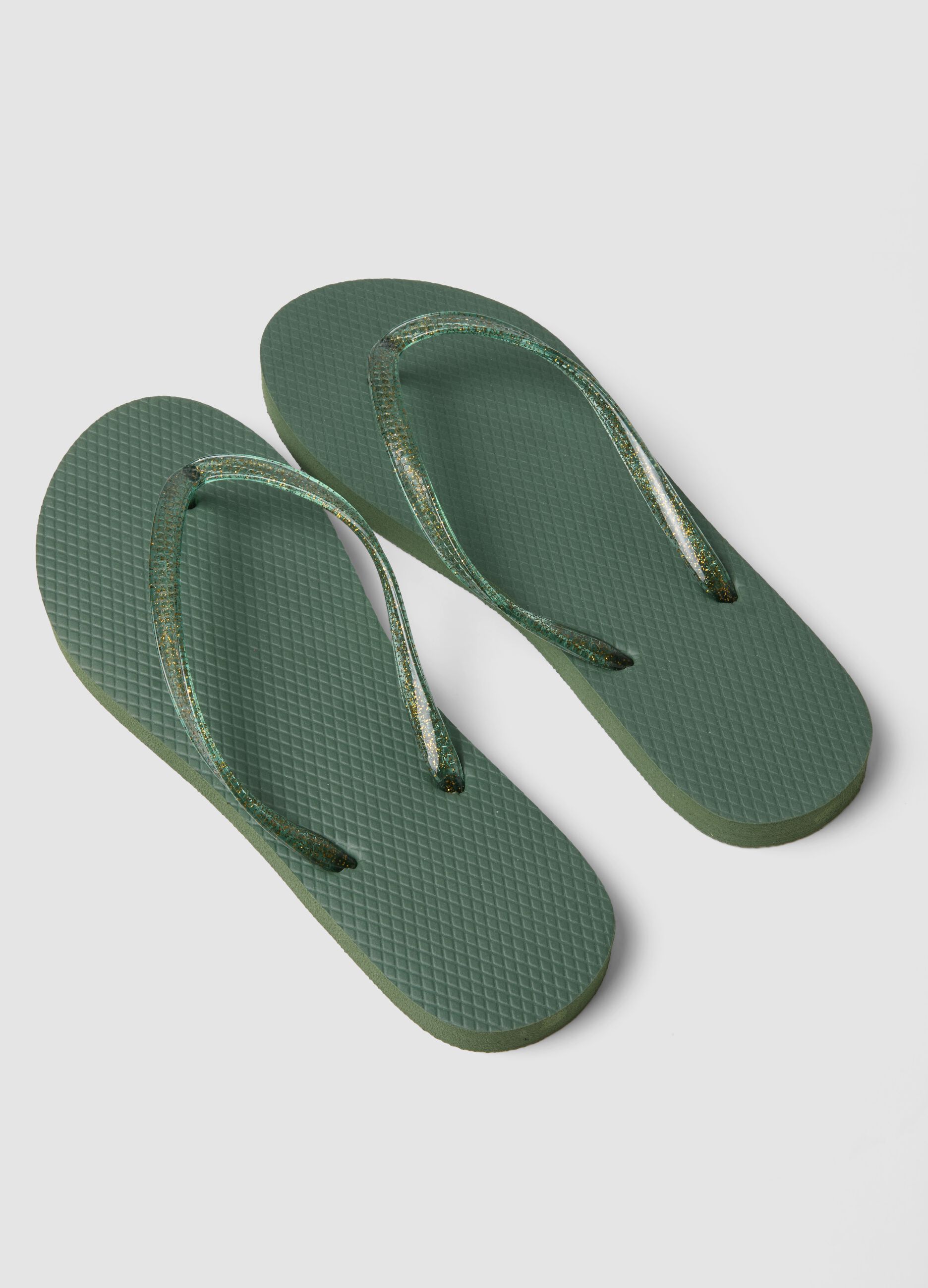 Green flip-flops with translucent straps