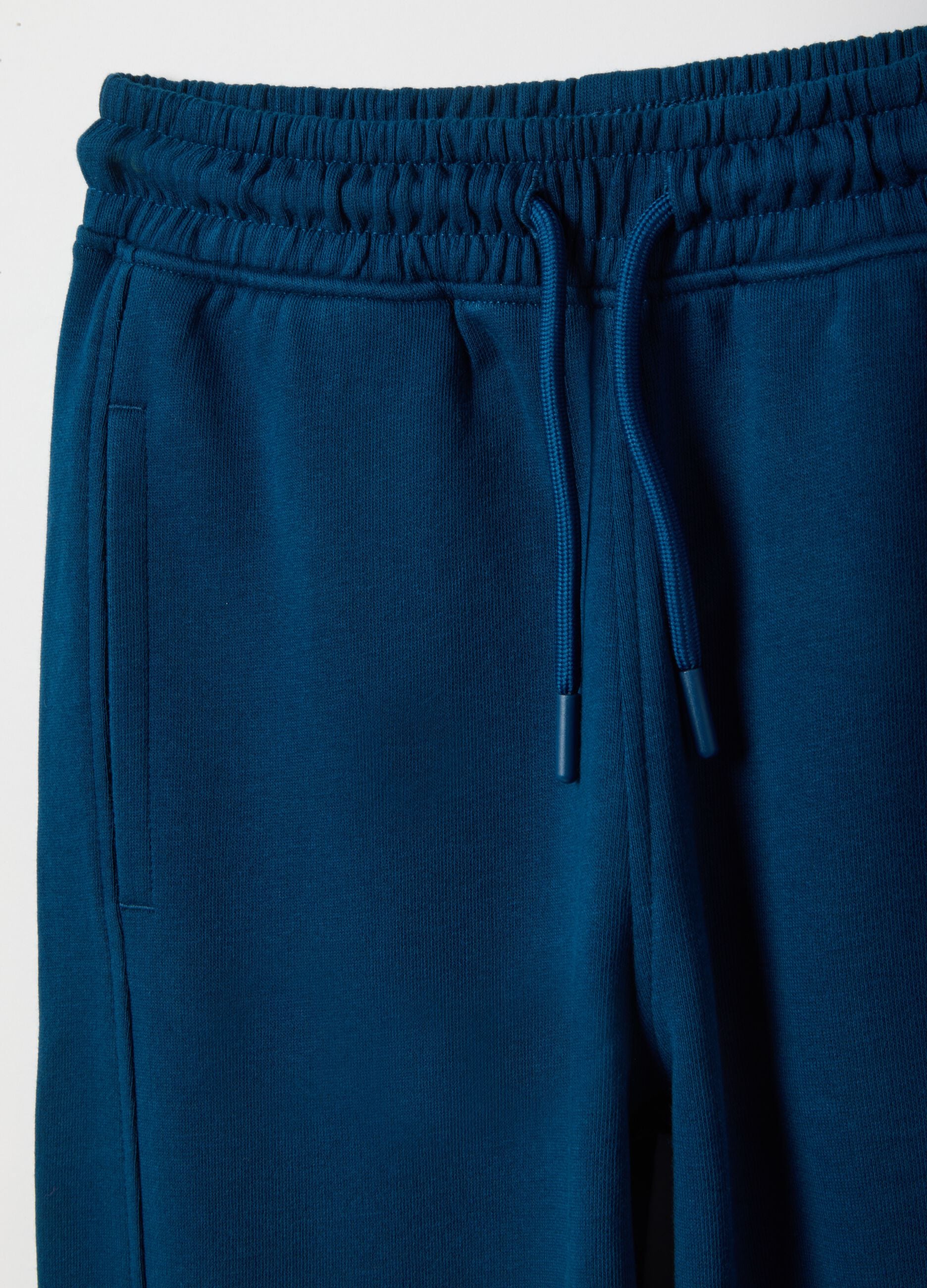 Boy's blue pure cotton regular fit jogger trousers with patch