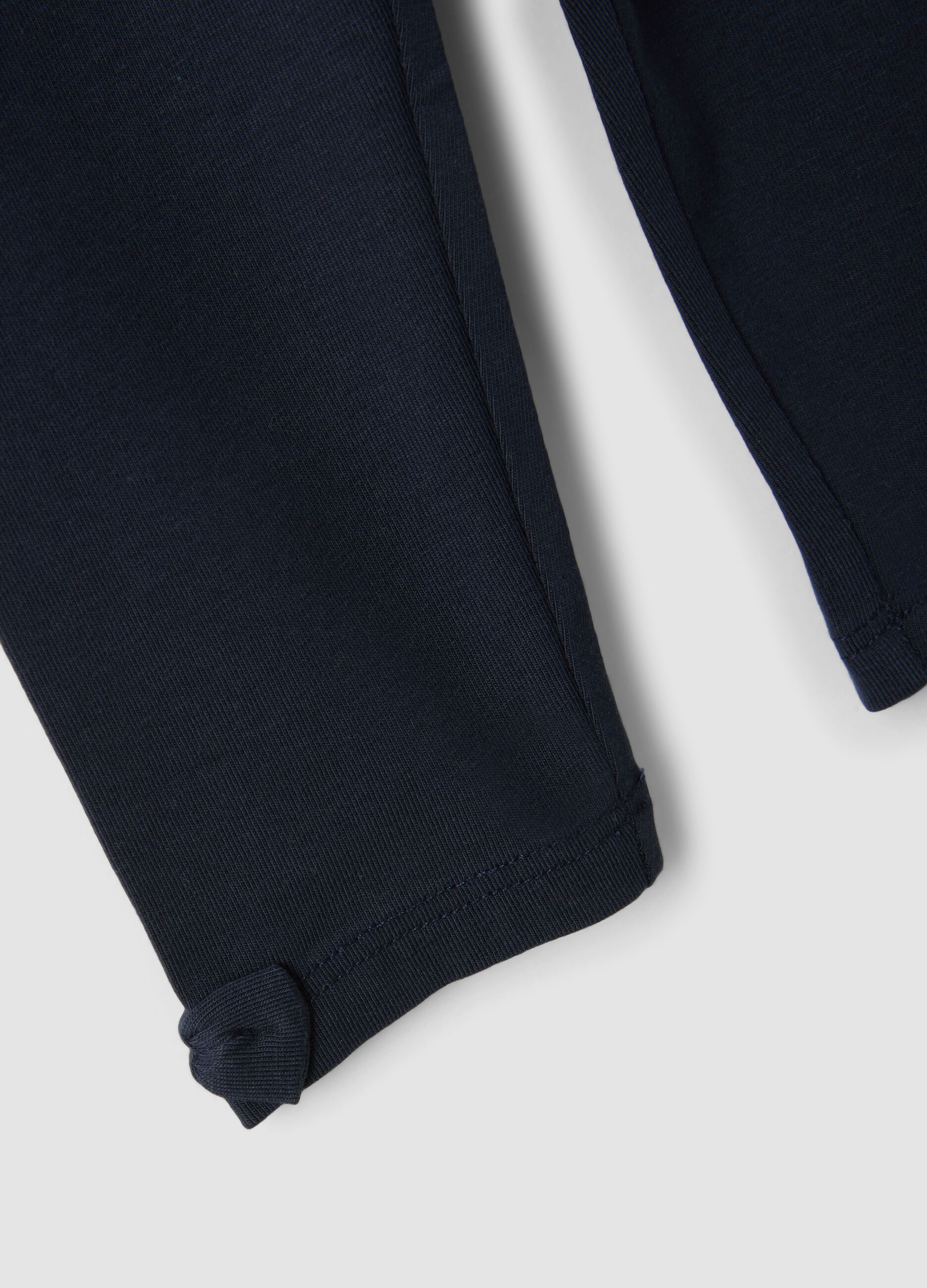 Blue stretch organic cotton leggings with bows for baby girl