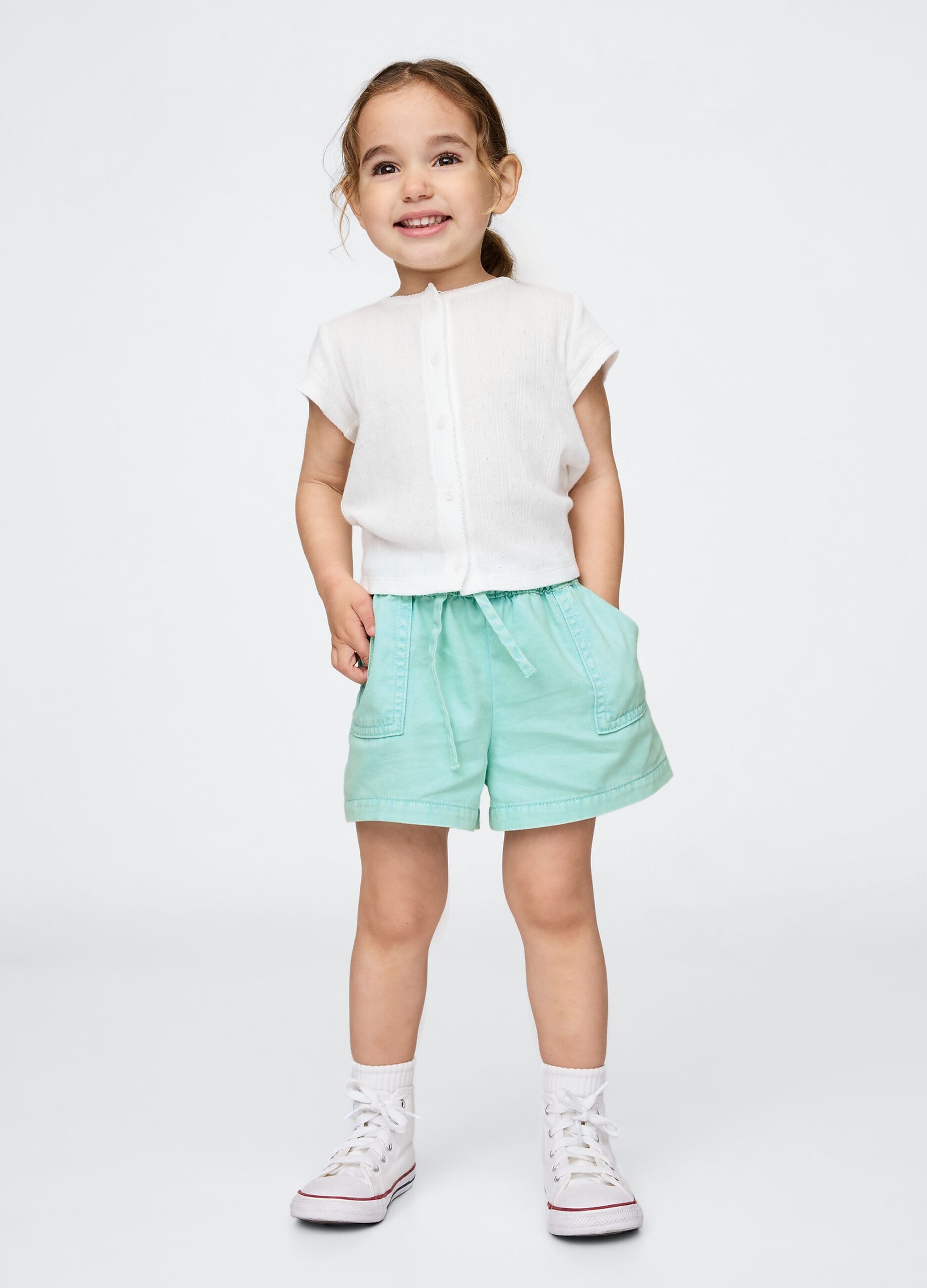 Light blue cotton girl's shorts with drawstring