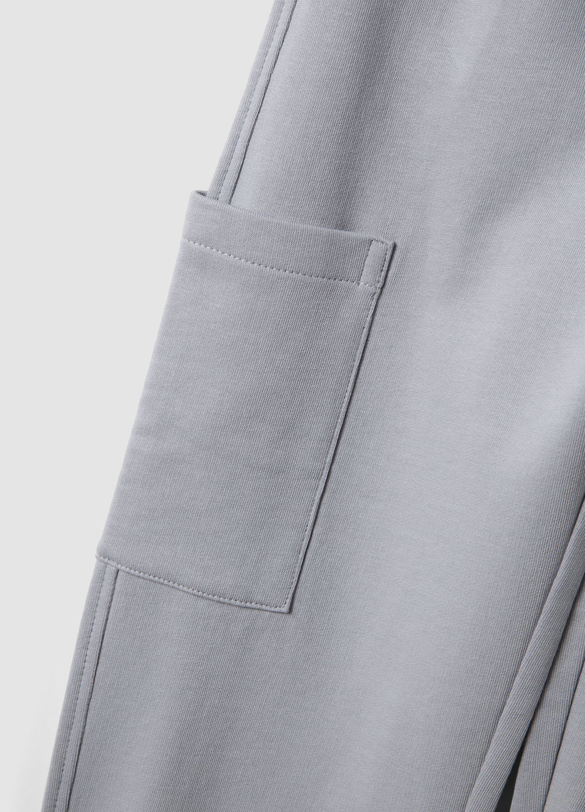 Pantaloni jogger grigi in puro cotone organico con tasche cargo per bambino