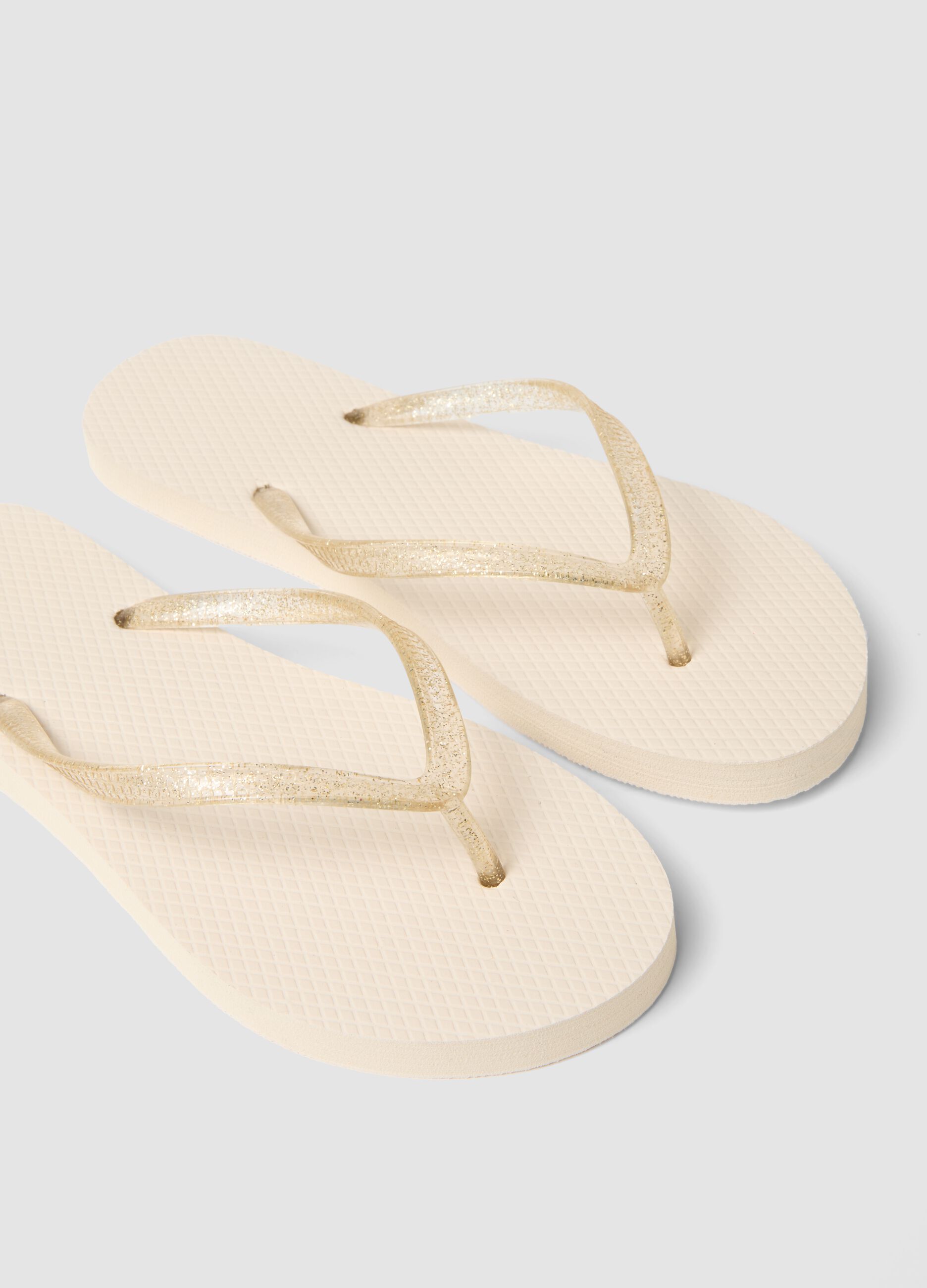 Beige flip-flops with translucent straps