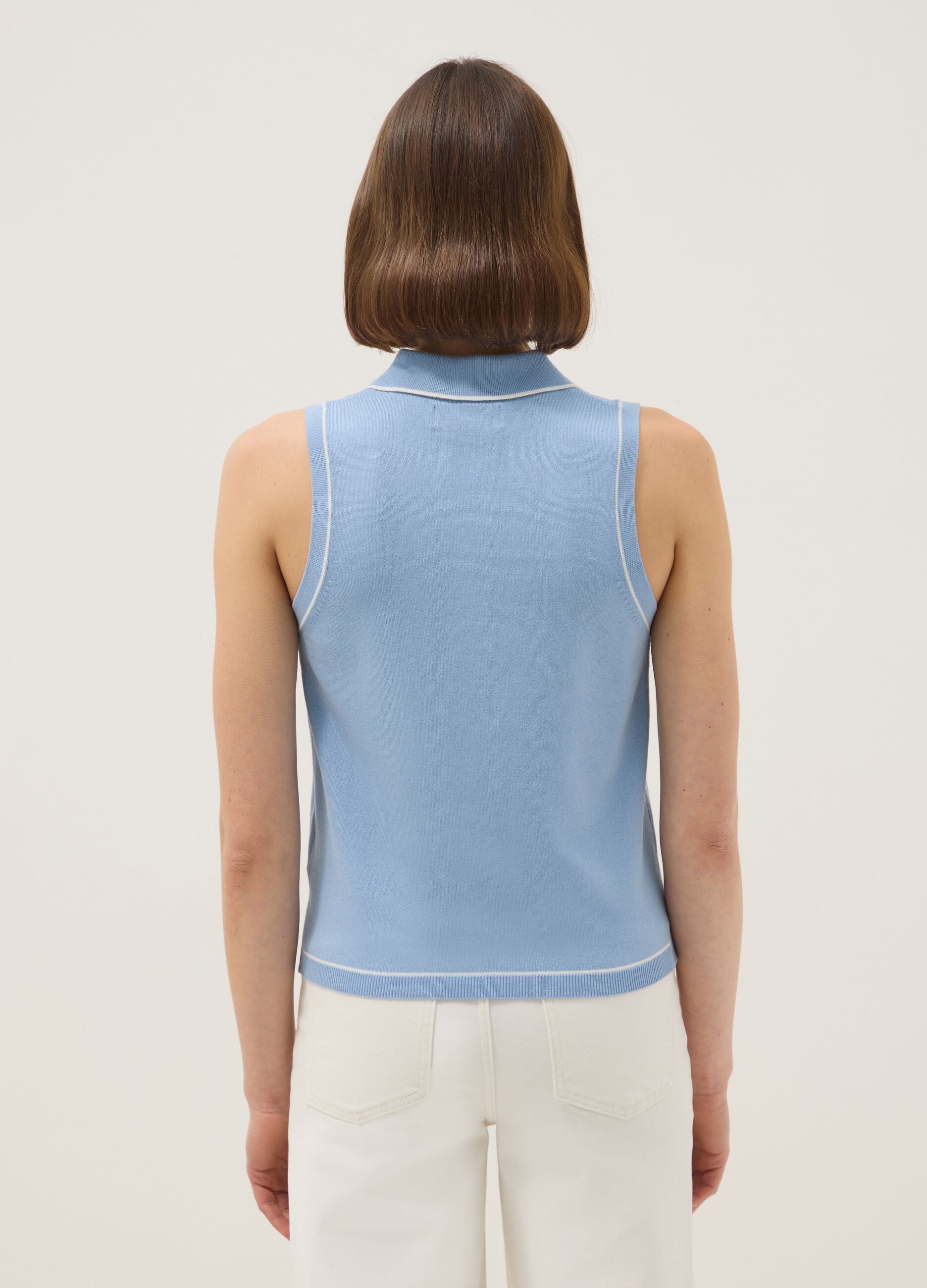 Sleeveless light blue viscose blend polo slim fit with buttons