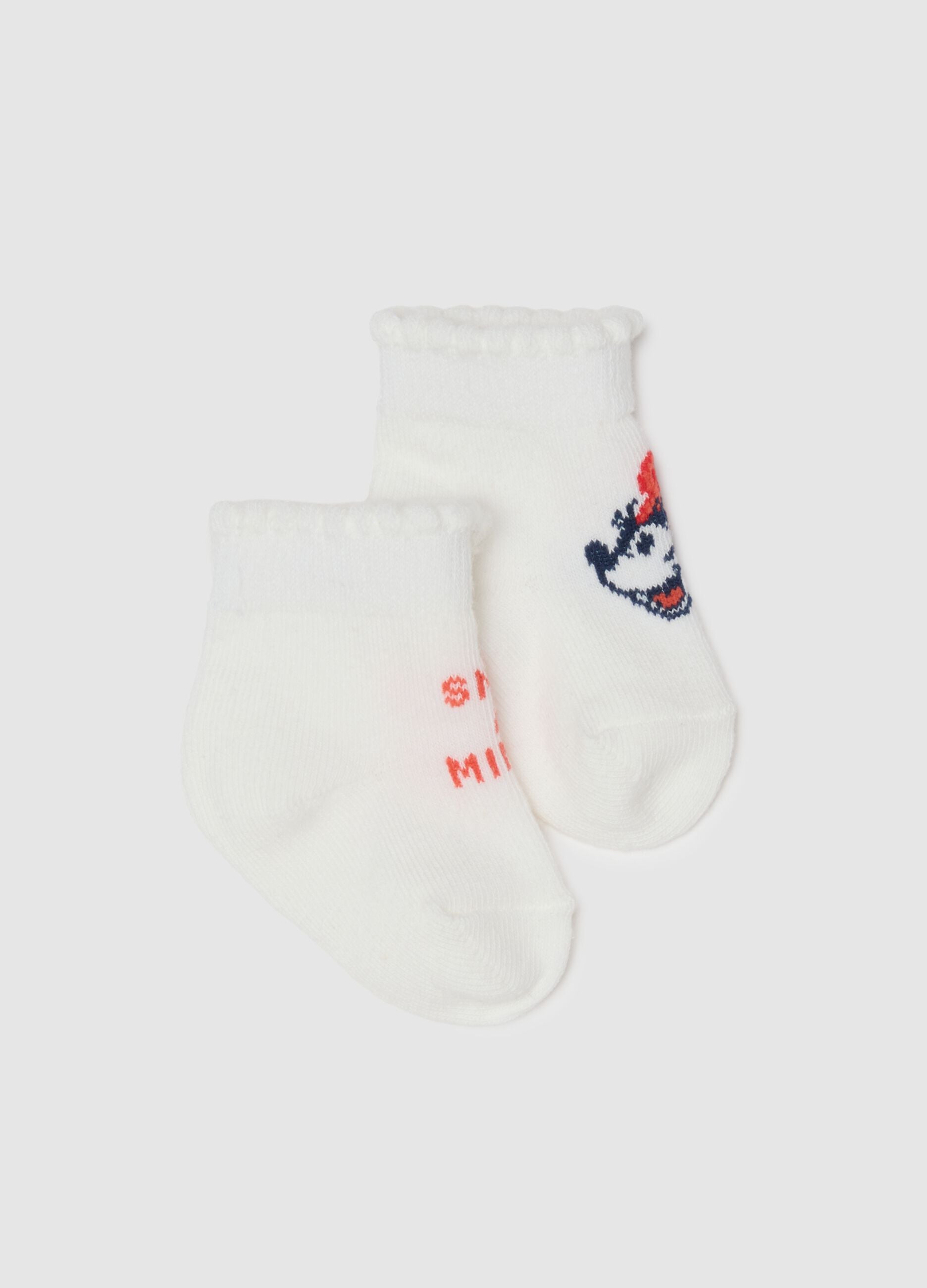 White knitted and cotton booties for babies with Minnie embroidery