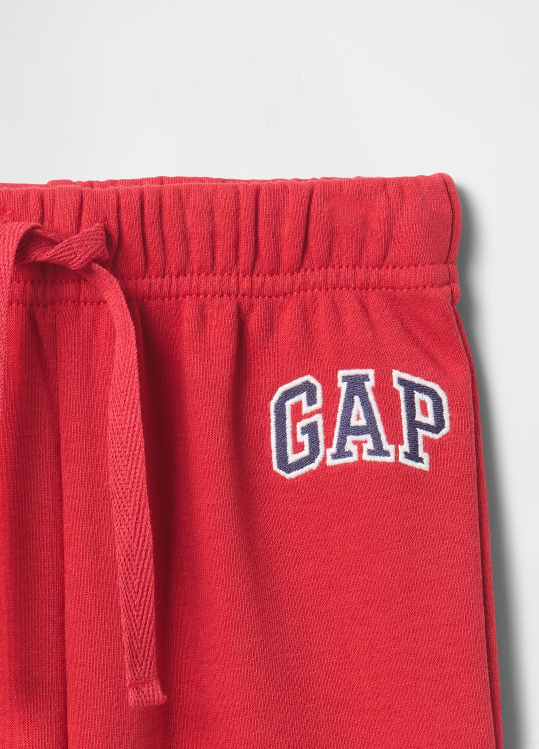 Red cotton blend trousers with elastic