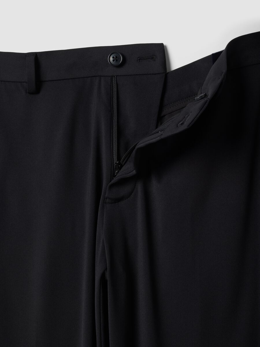 Pantaloni formali neri in tessuto elasticizzato 4 Way Stretch slim fit_1
