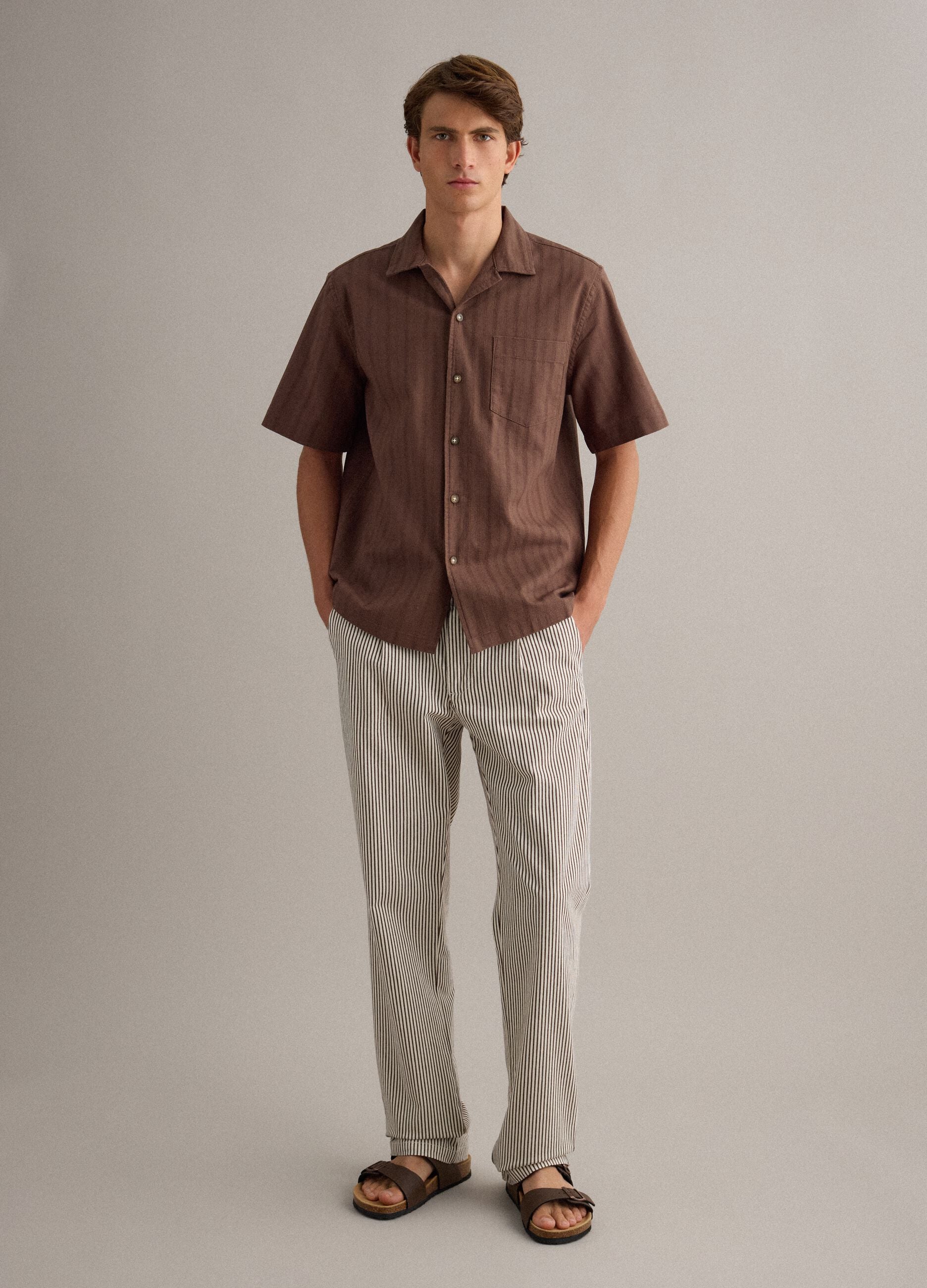 Brown double-strap sandals with buckles