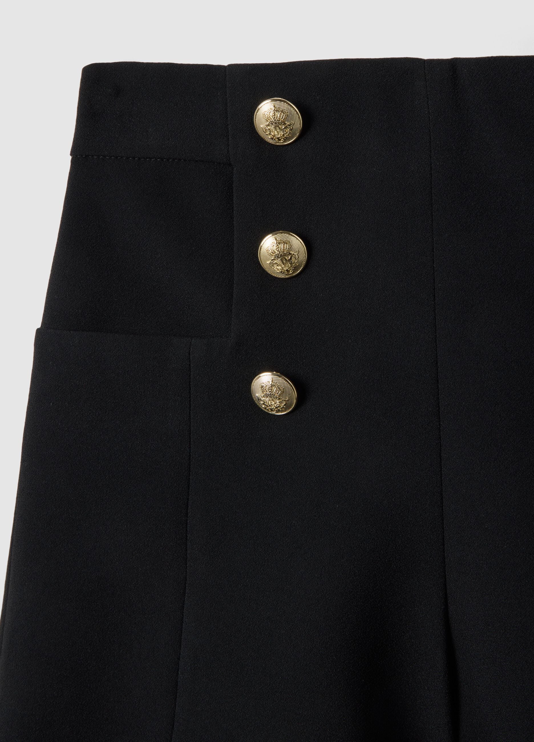 Black regular fit shorts with high waist and gold buttons