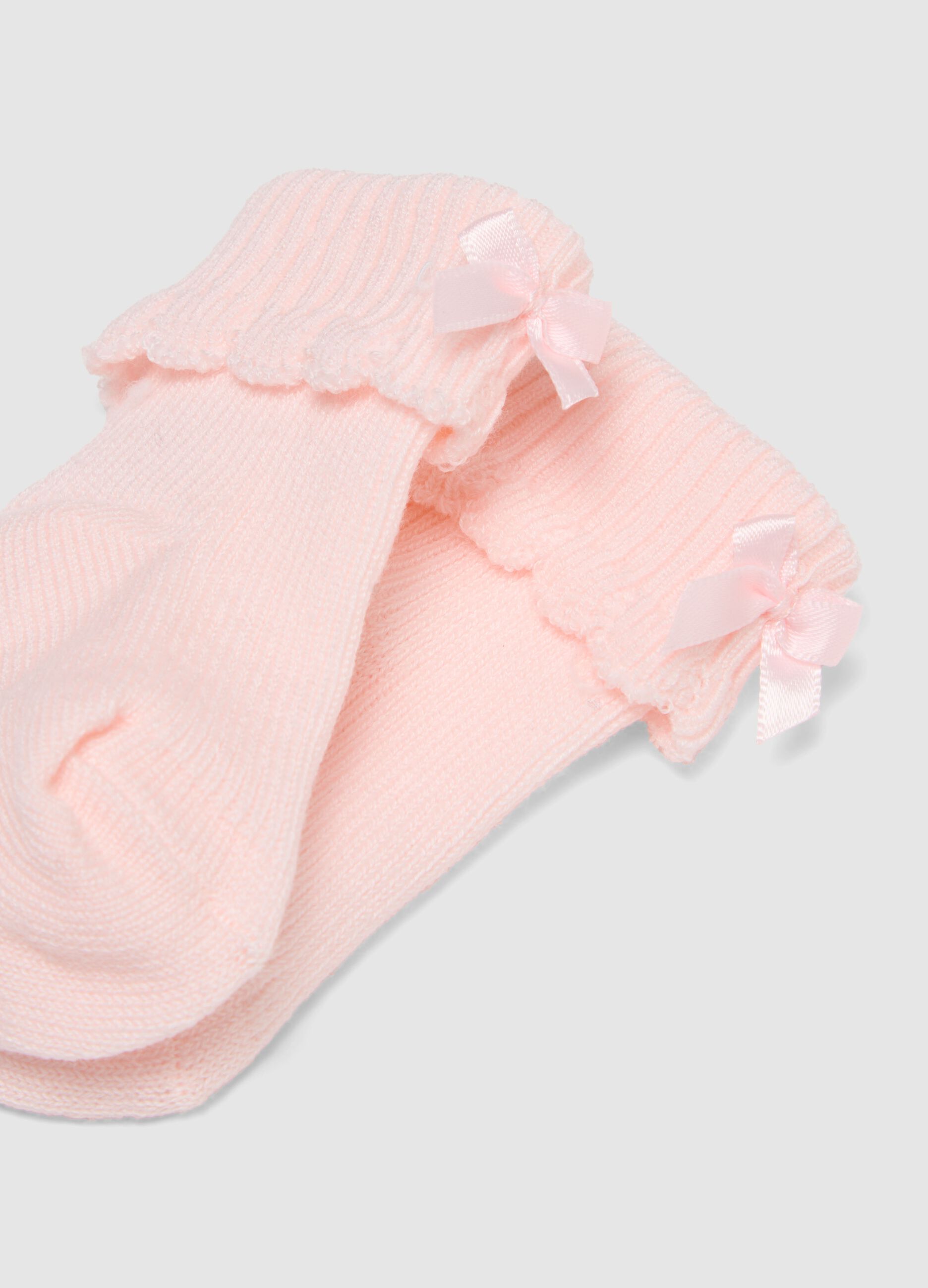 Baby girl's pink stretch cotton blend booties with bow