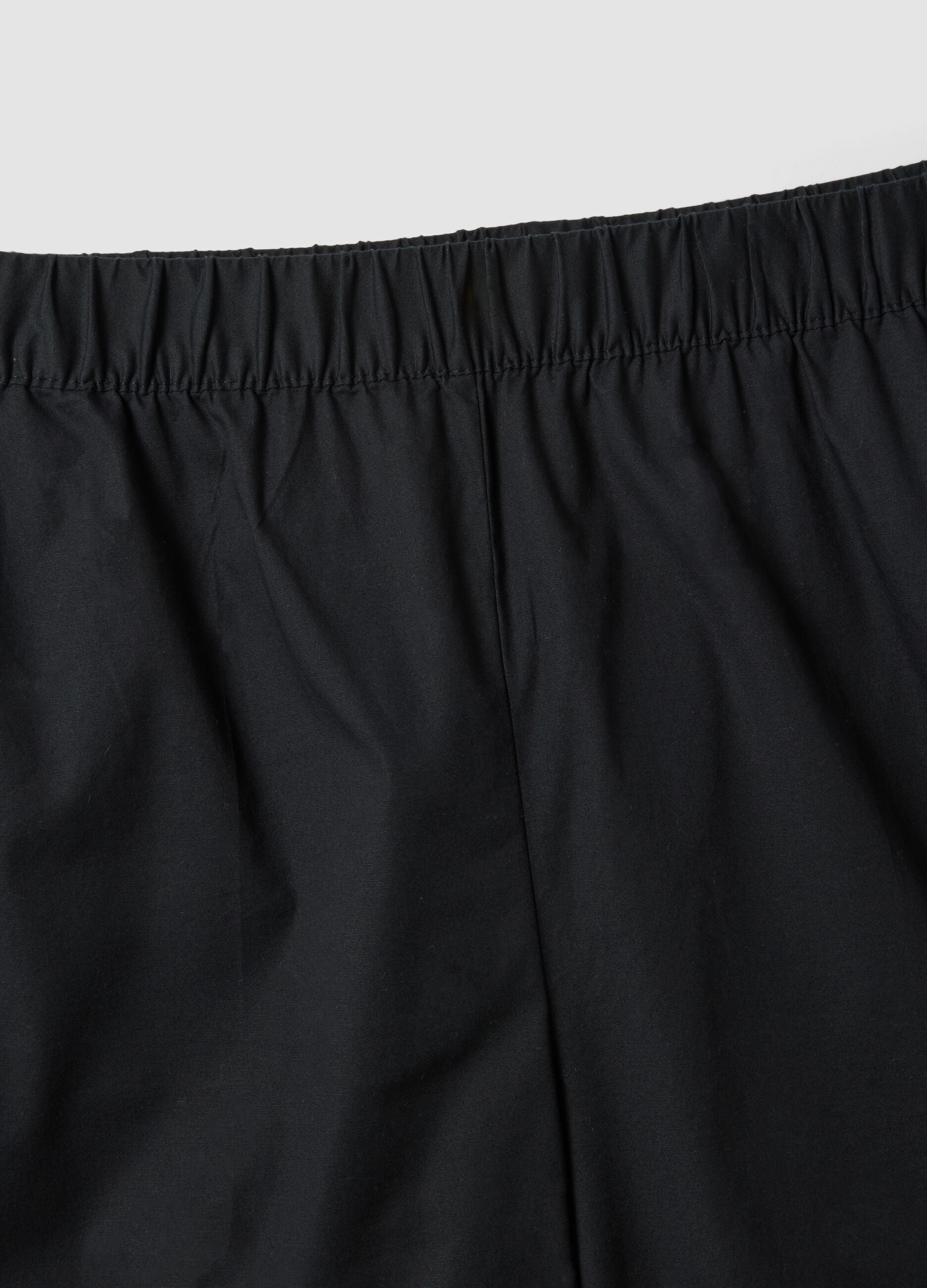 Black stretch cotton wide-leg trousers