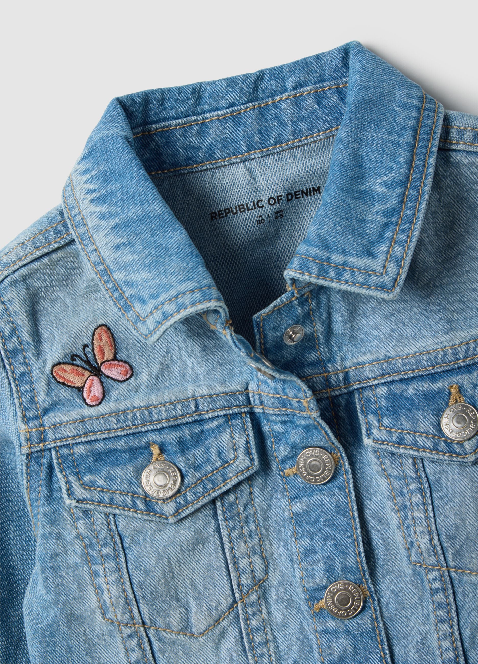 Blue regular fit pure cotton denim jacket with embellishments