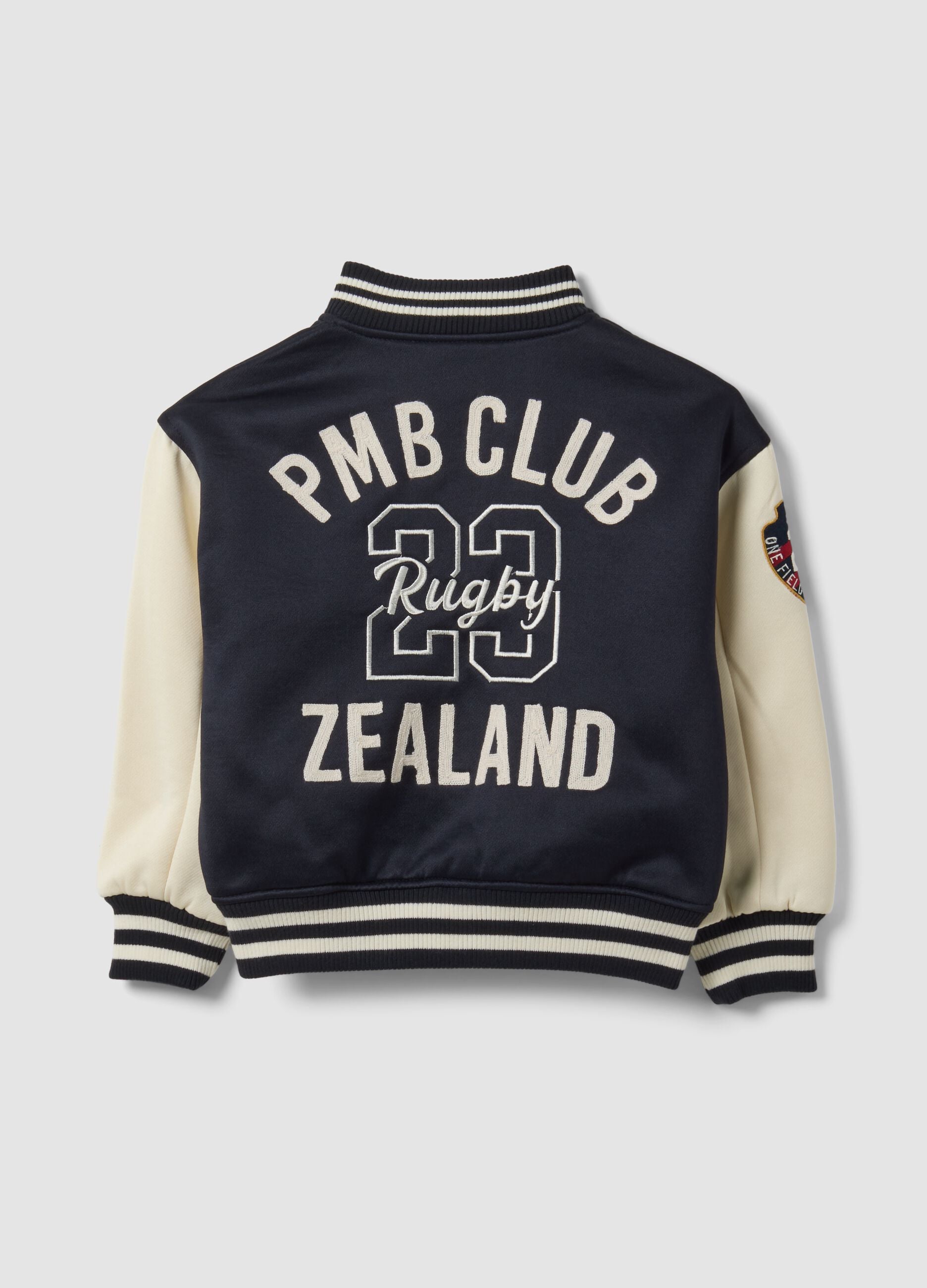 Blue varsity jacket with beige sleeves and print for boys