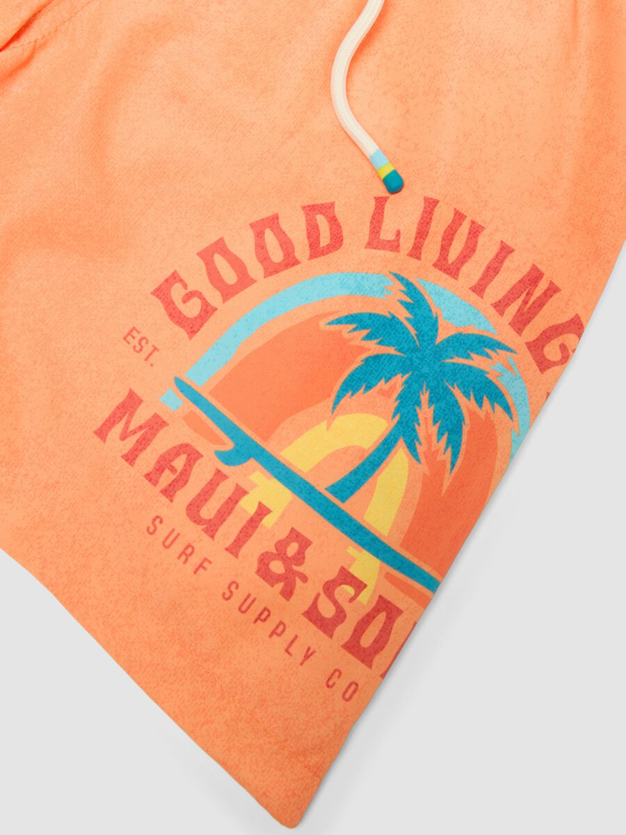 Boxer da mare arancione da ragazzo con stampa tropicale_2