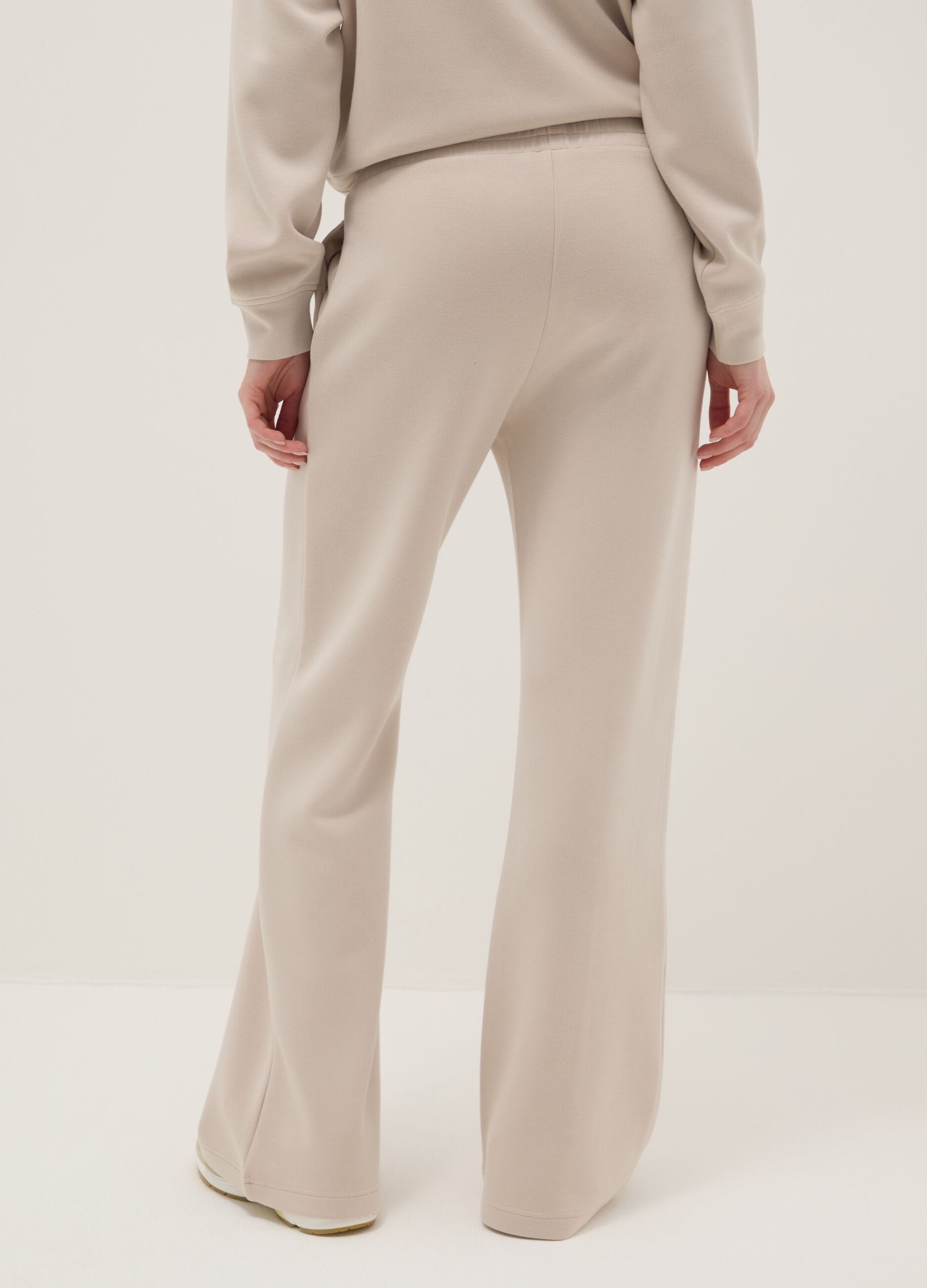 Beige wide leg trousers in stretch modal blend