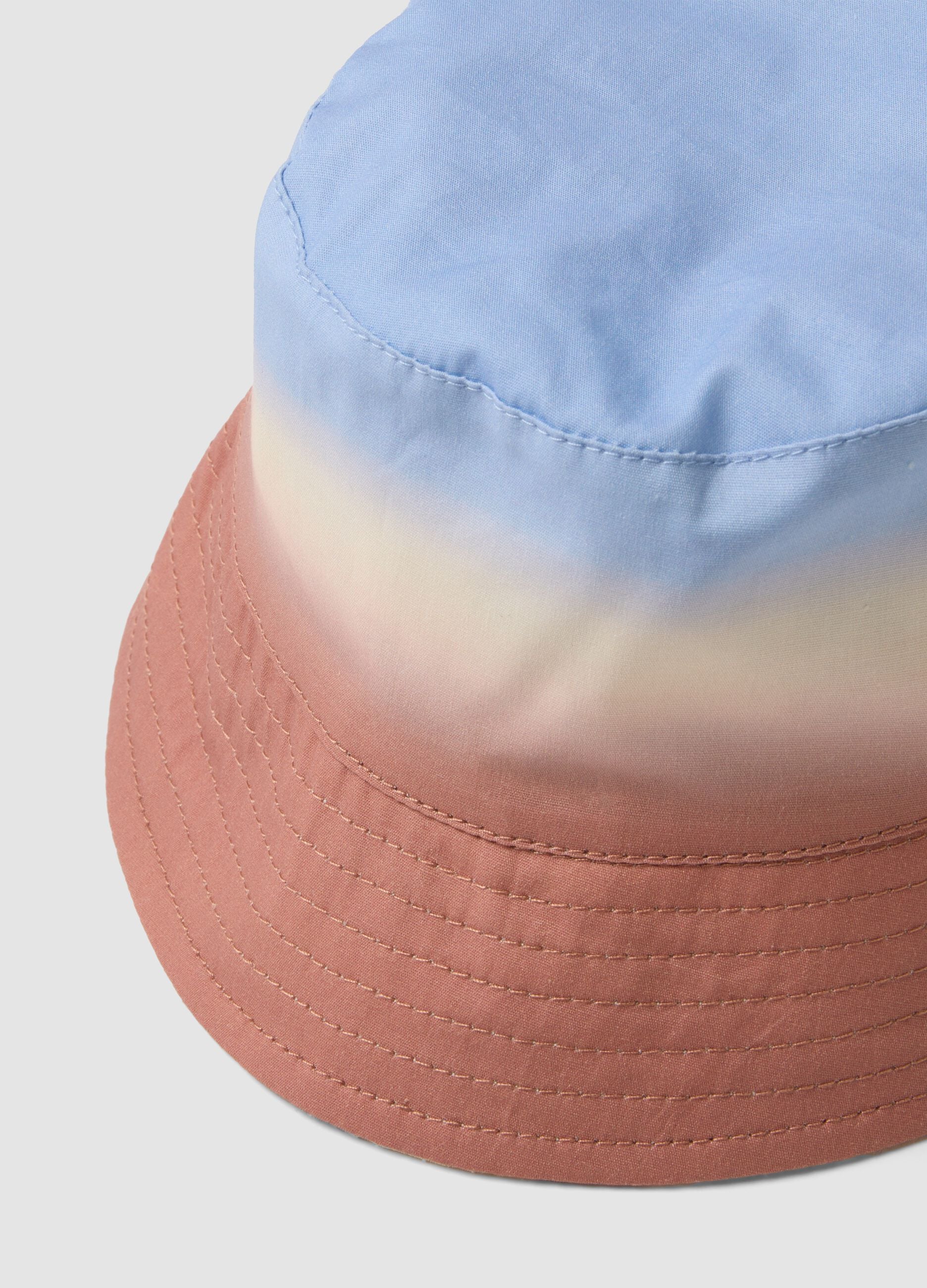 Reversible multicolour 100% cotton kids&rsquo; hat