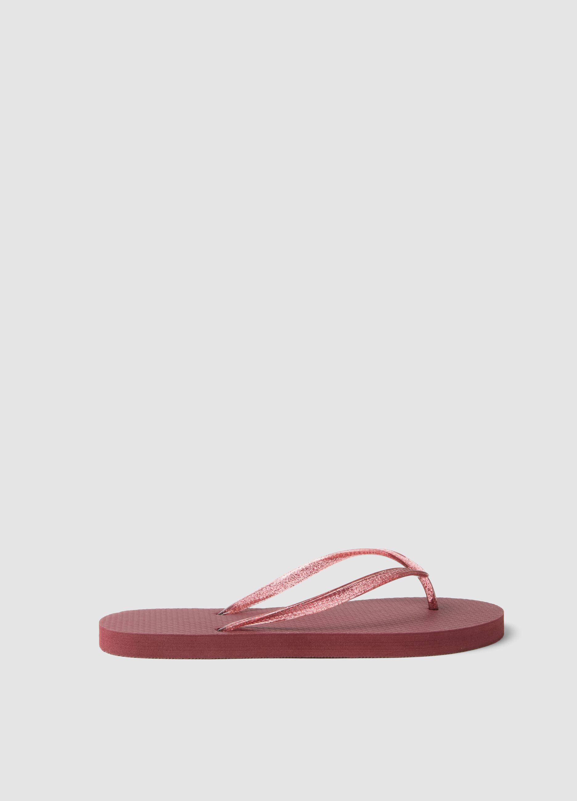Pink flip-flops with translucent straps