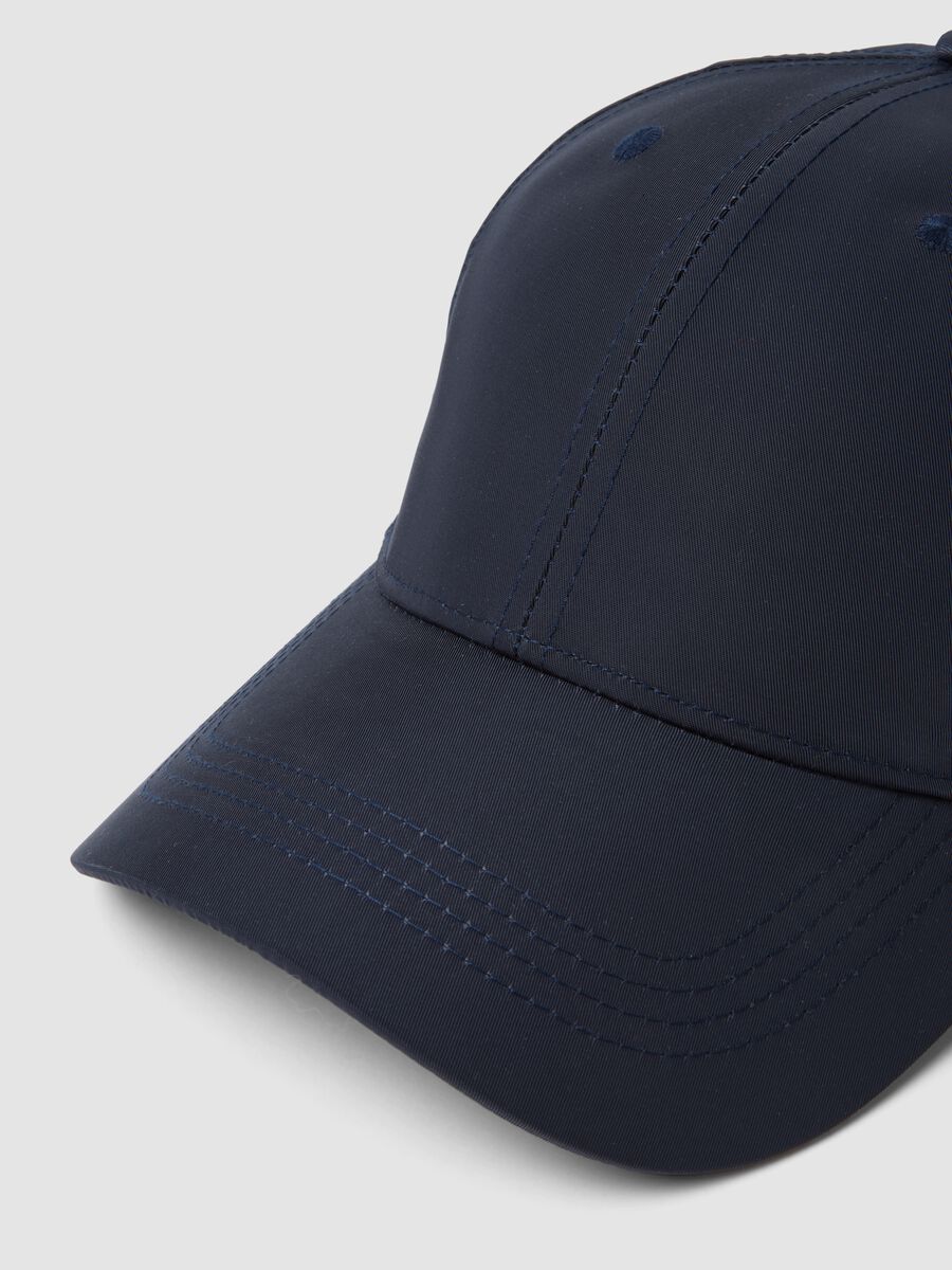 Blue cap with curved peak_3