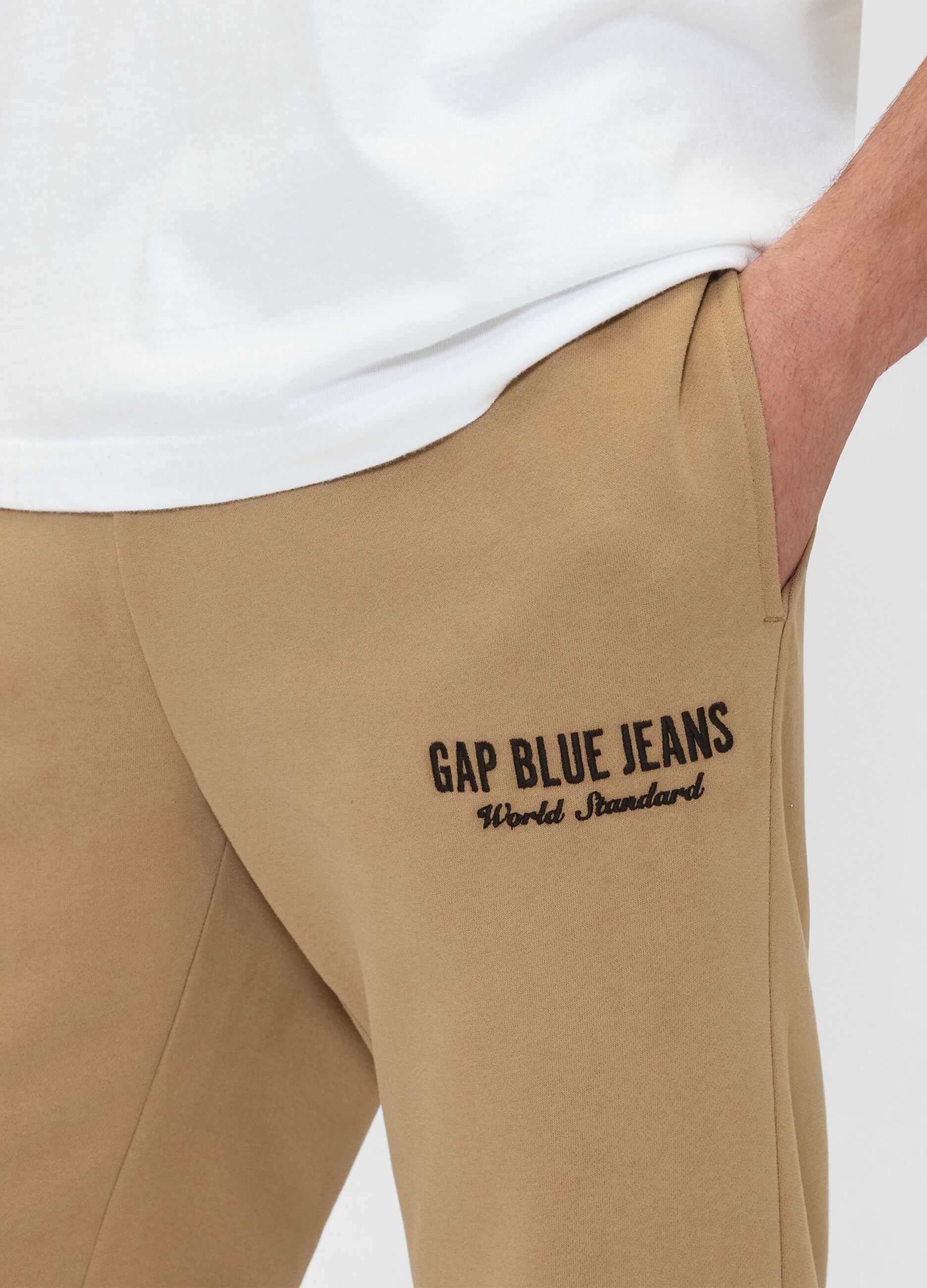 Beige jogger trousers in cotton and polyester blend