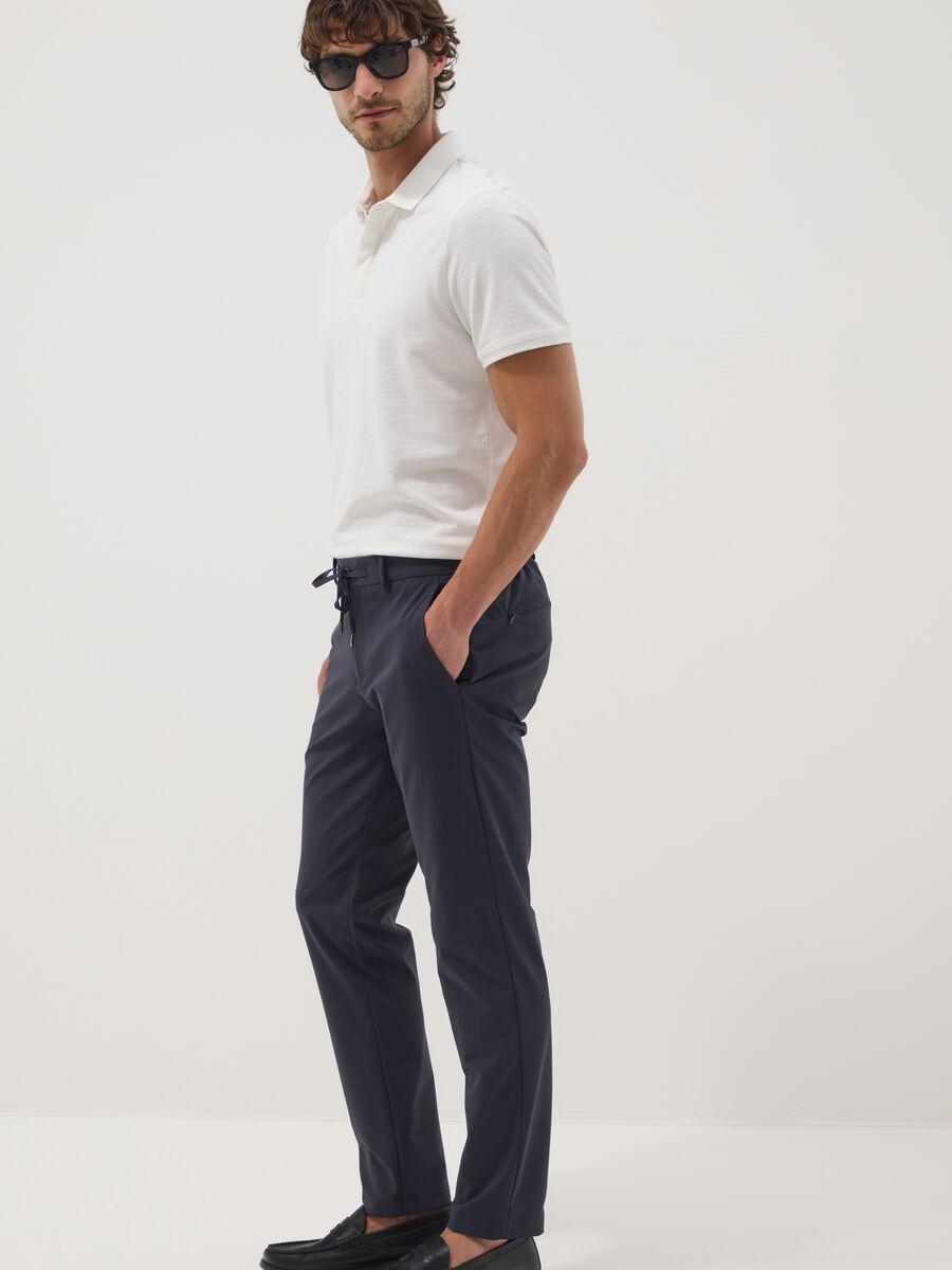Blue stretch-fabric chino trousers_1