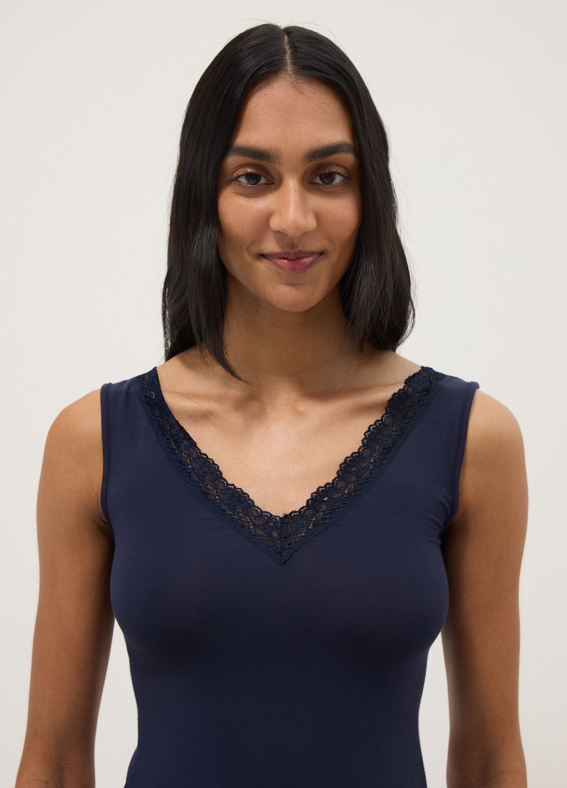 Blue stretch viscose tank top with deep V lace trim regular fit