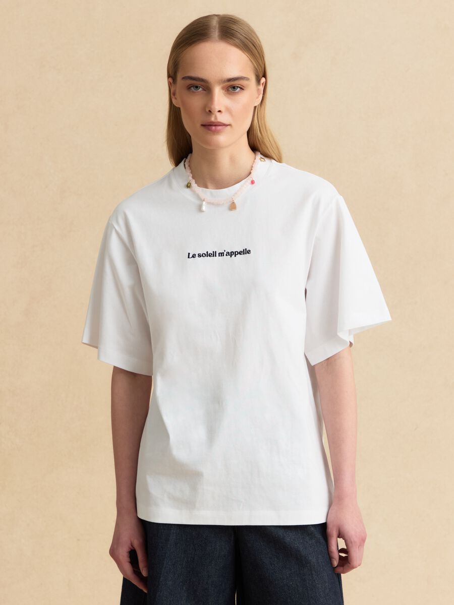 T-shirt a maniche corte bianca in puro cotone regular fit con frase_1