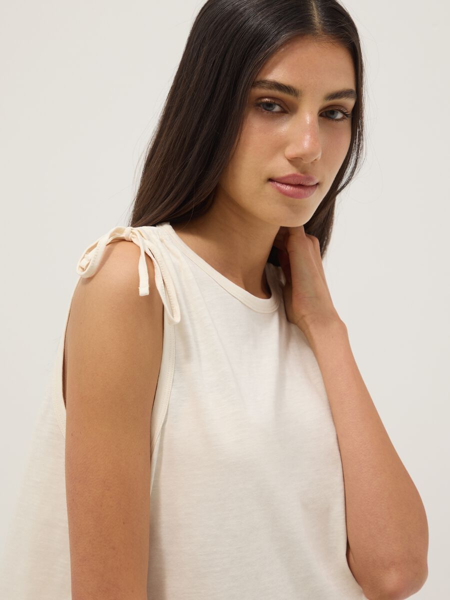 Beige pure cotton top with shoulder ties_0