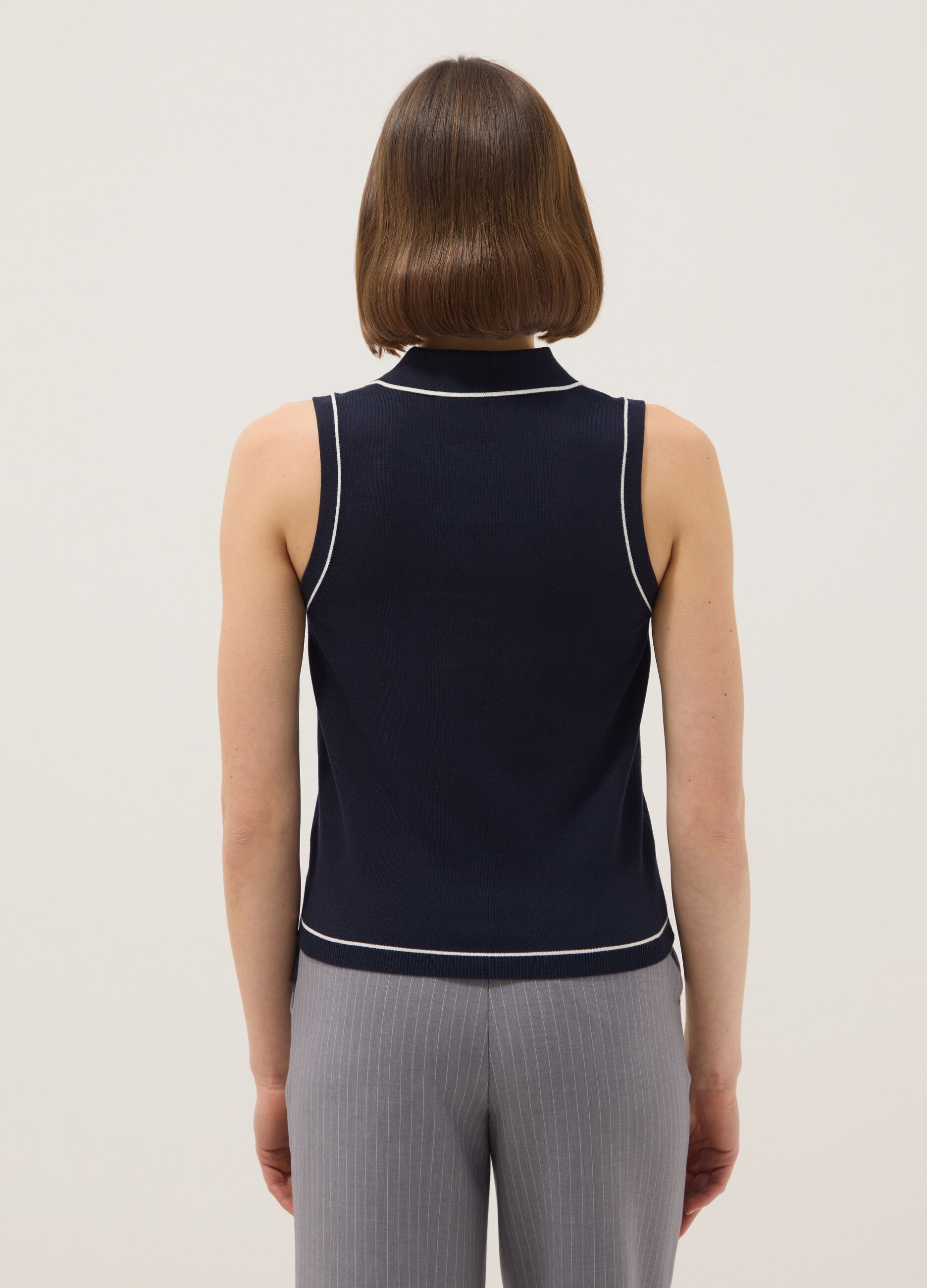 Sleeveless blue viscose blend slim fit polo with buttons