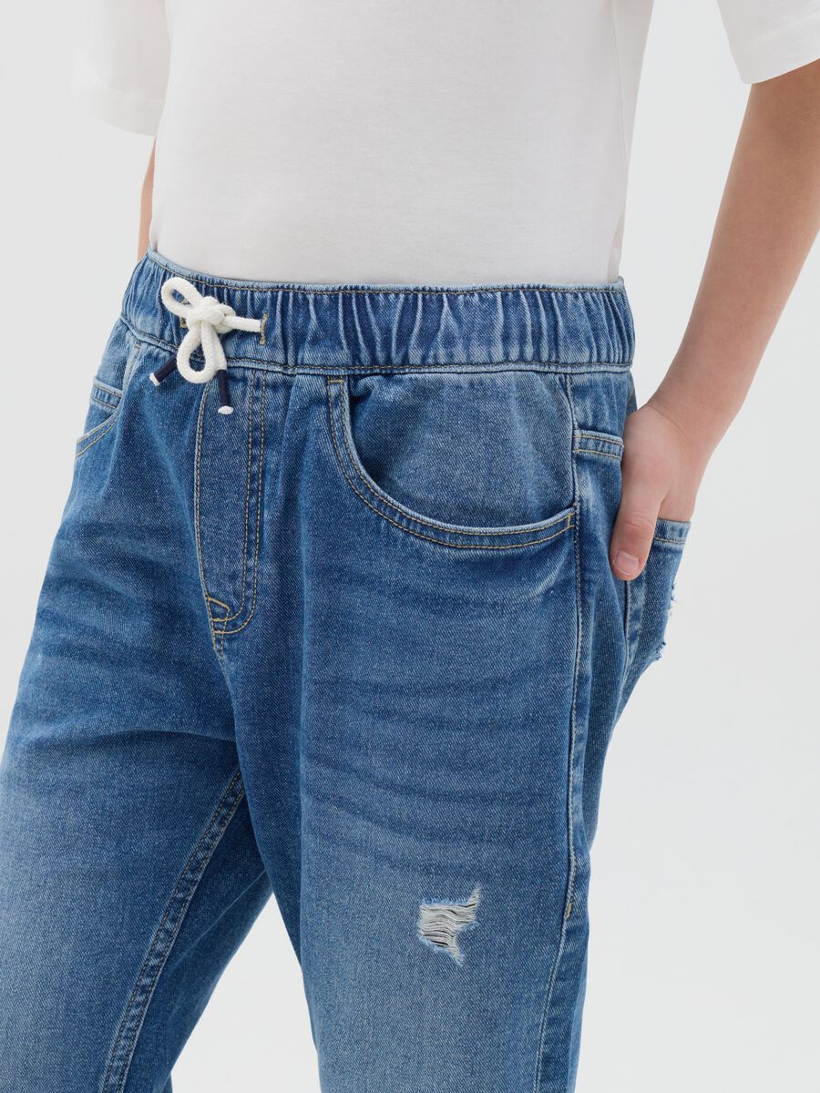 Carrot-fit joggers in denim with drawstring_1
