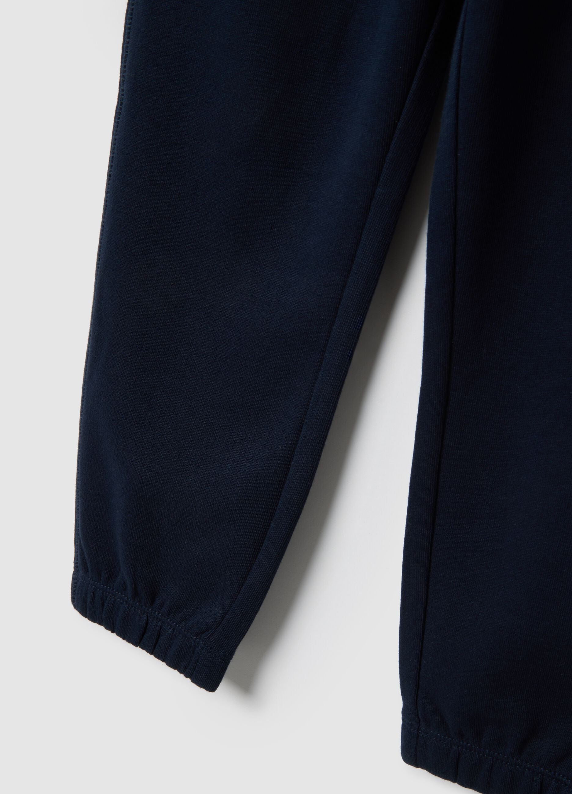 Kids' blue jogger trousers in pure cotton, regular fit with logo