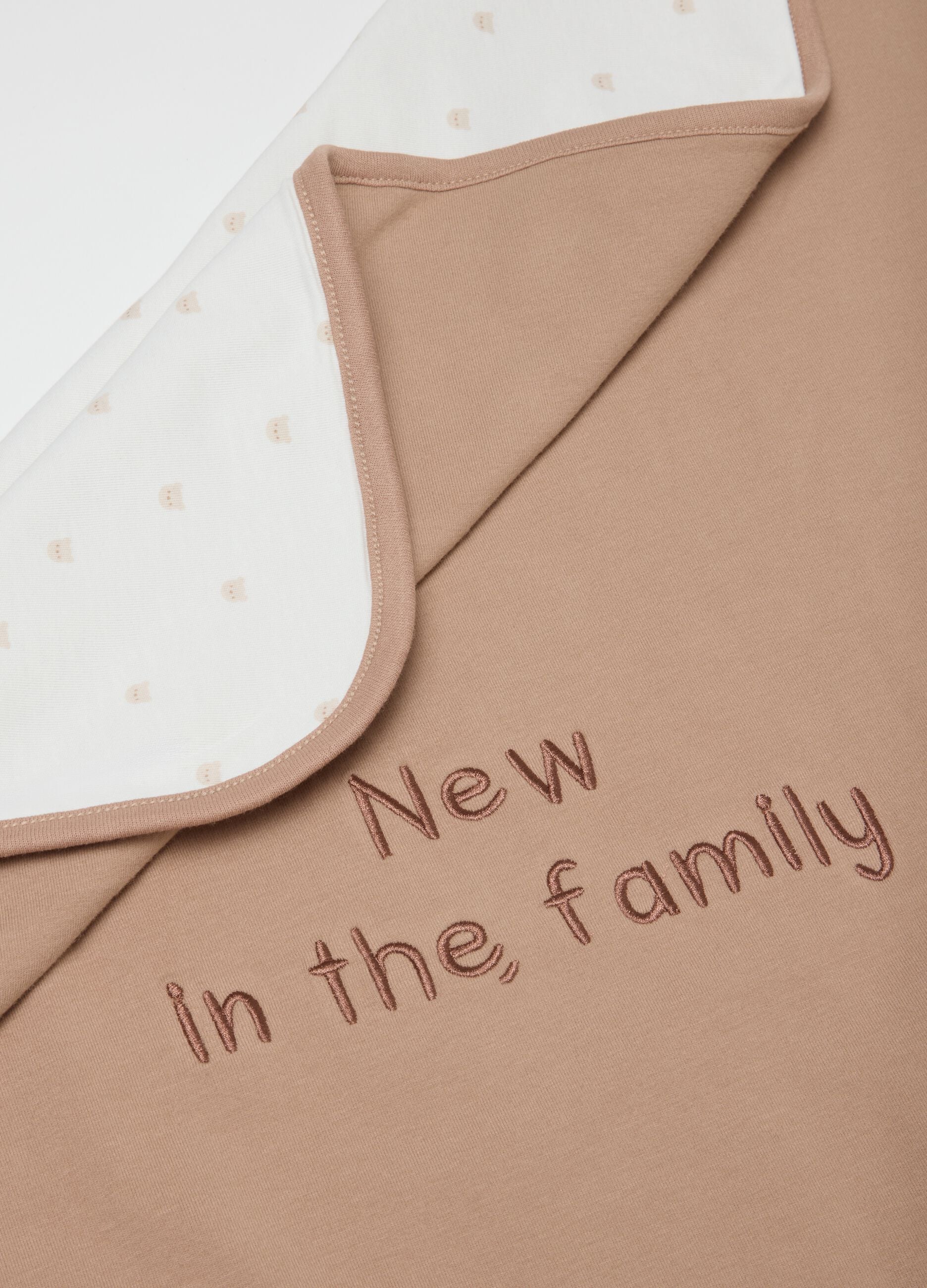 Soft beige newborn cover in stretch cotton