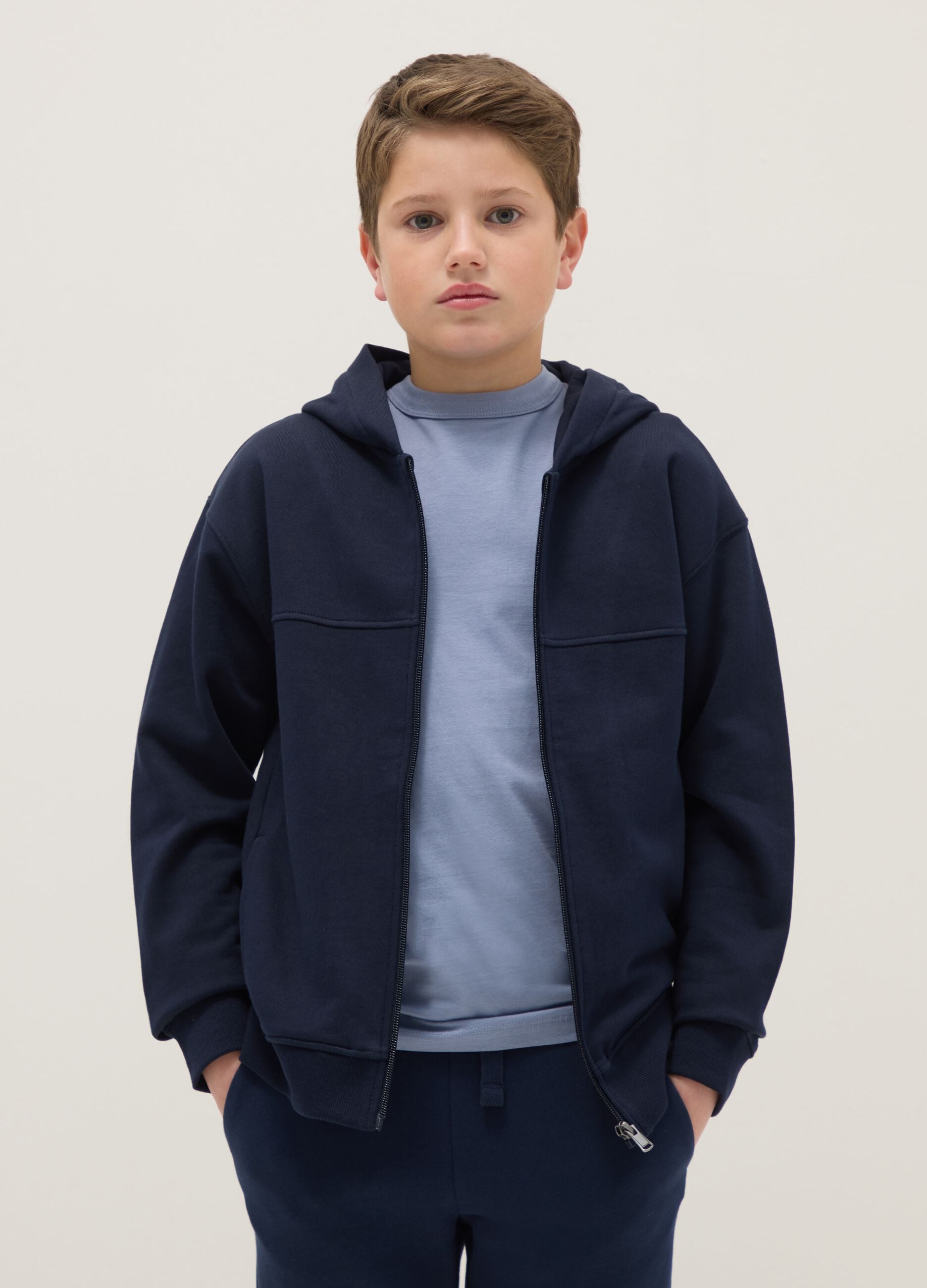 Boy's blue hoodie in pure cotton with oversized fit and zip