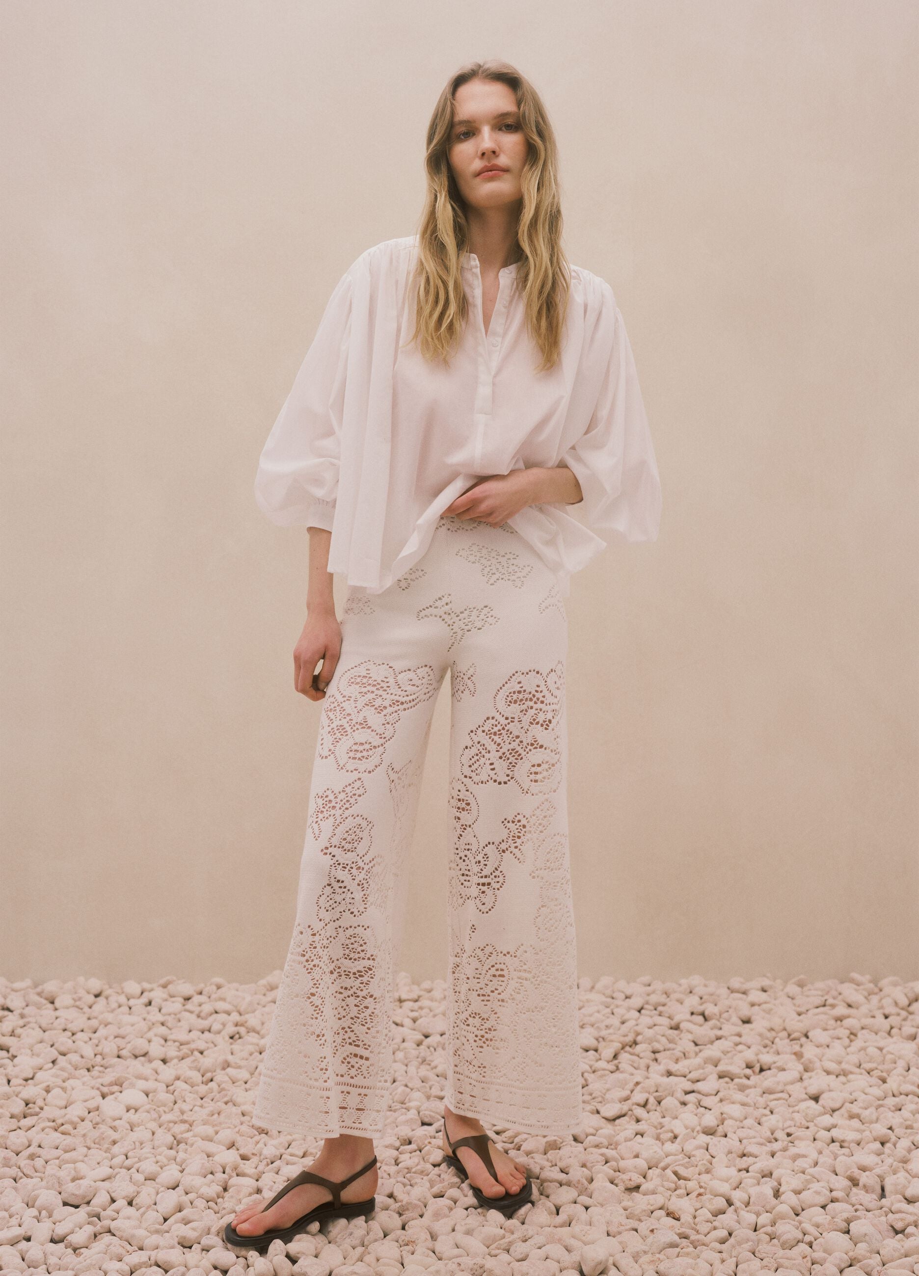 White wide leg cotton blend trousers with perforated texture