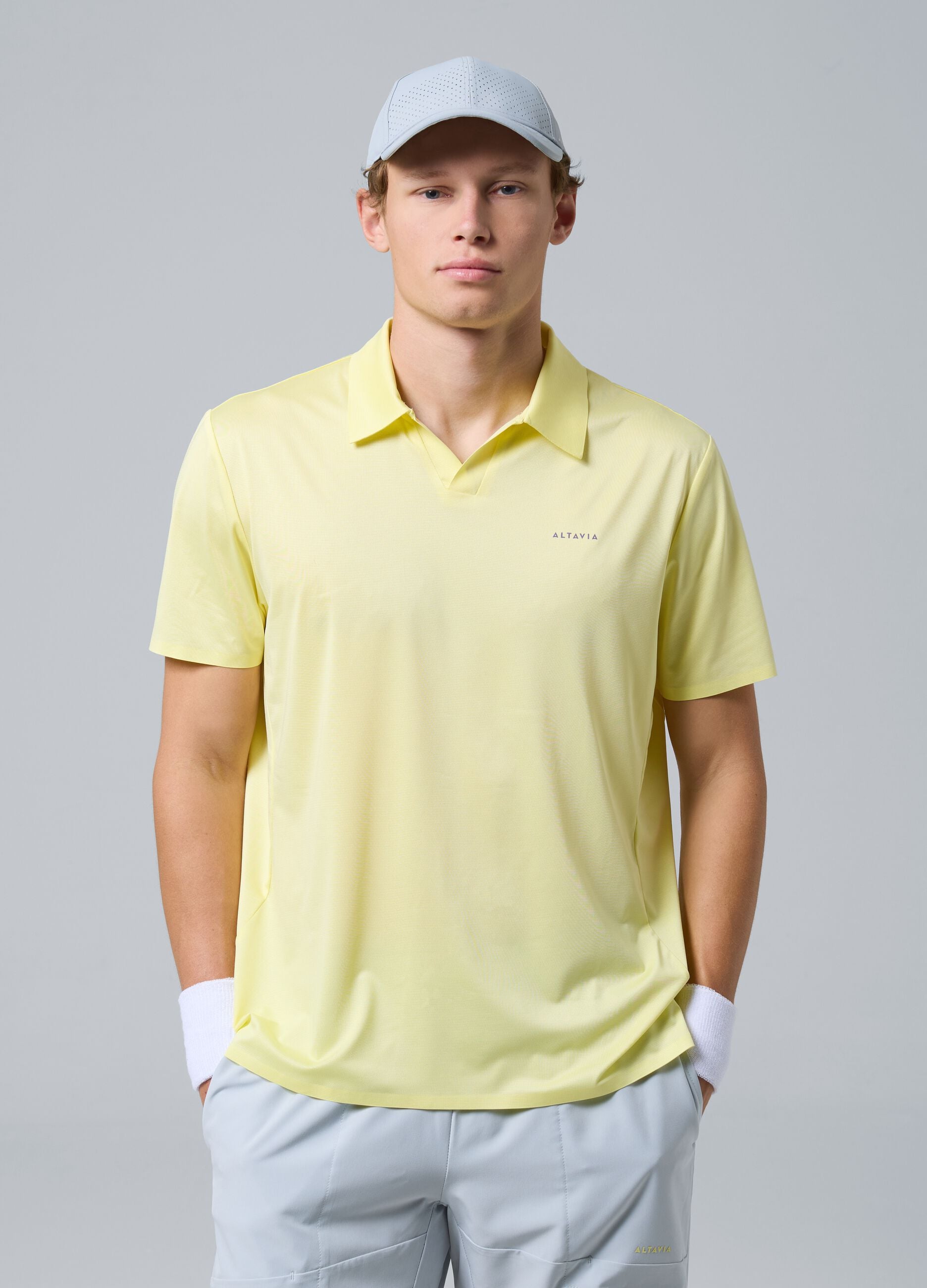 Yellow ALTAVIA COURT stretch performance polo