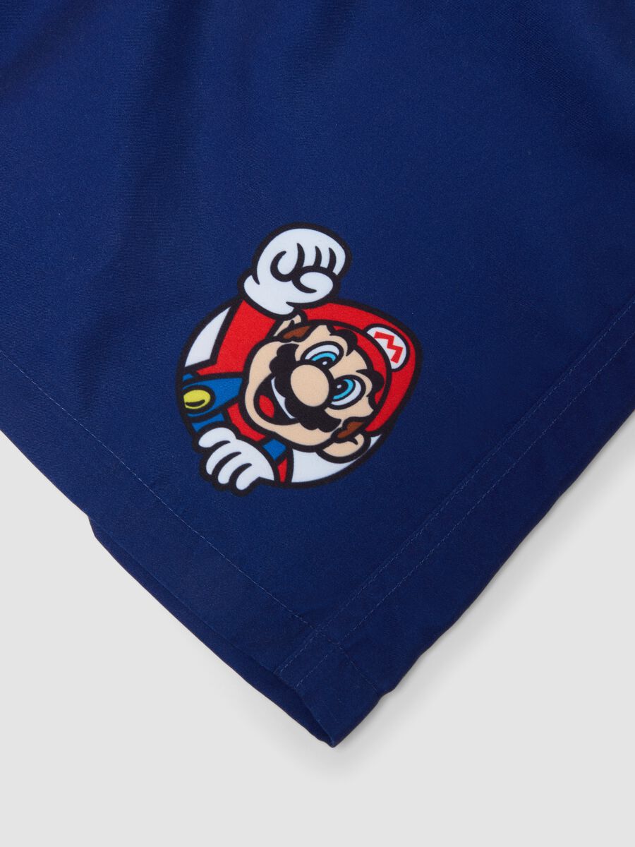 Blue regular fit swim trunks with Super Mario print_3