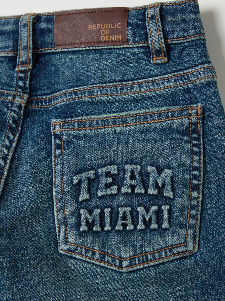 Straight-fit jeans with abrasions and print_3