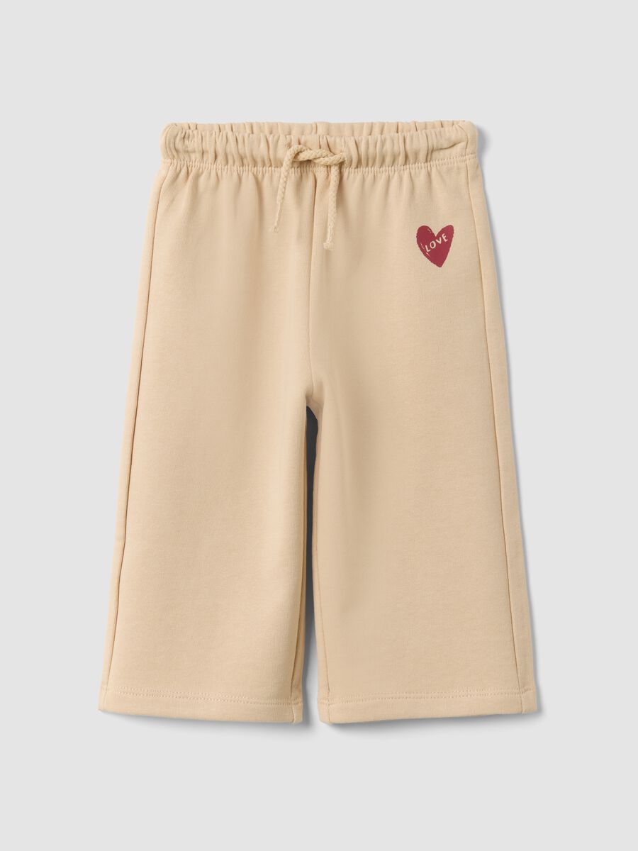 Beige pure cotton trousers with elasticated waist and print for baby girl_0