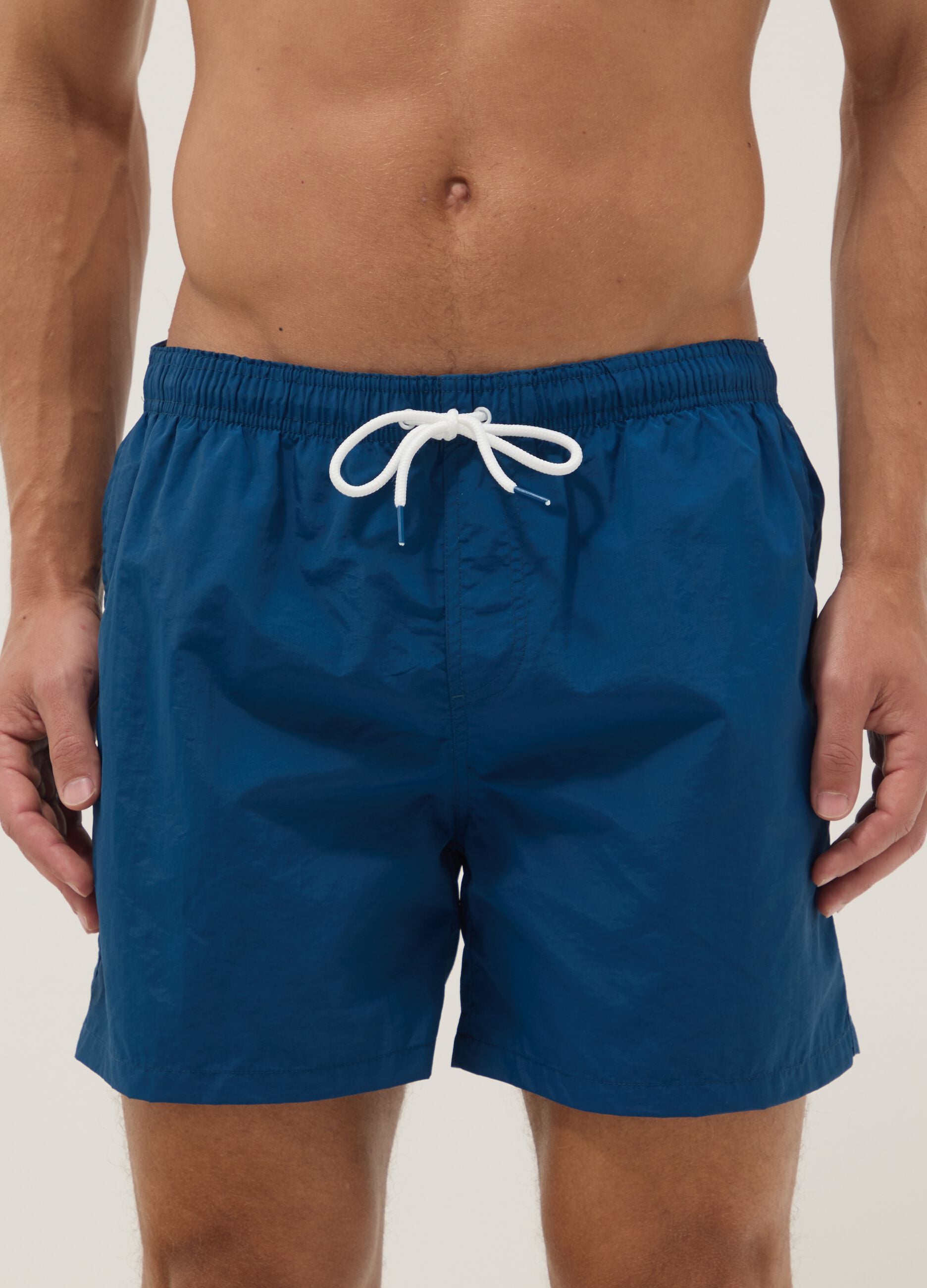 Blue regular-fit swim shorts with drawstring