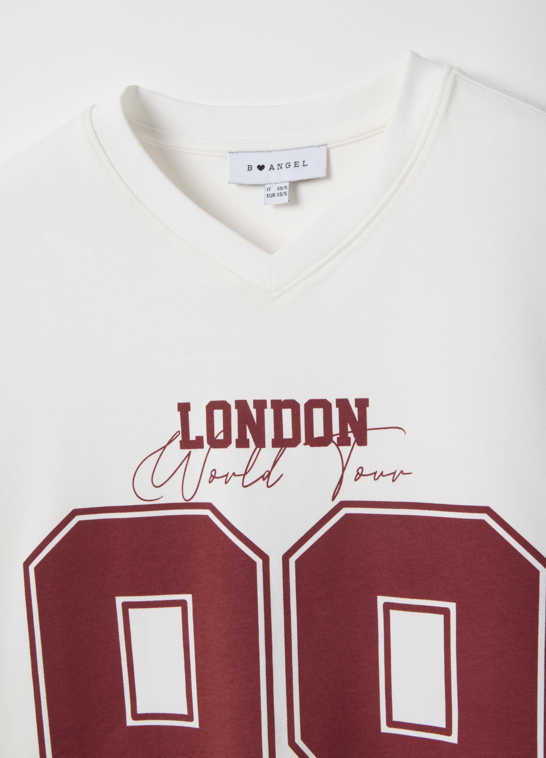 Oversized white pure cotton T-shirt with print and V-neck