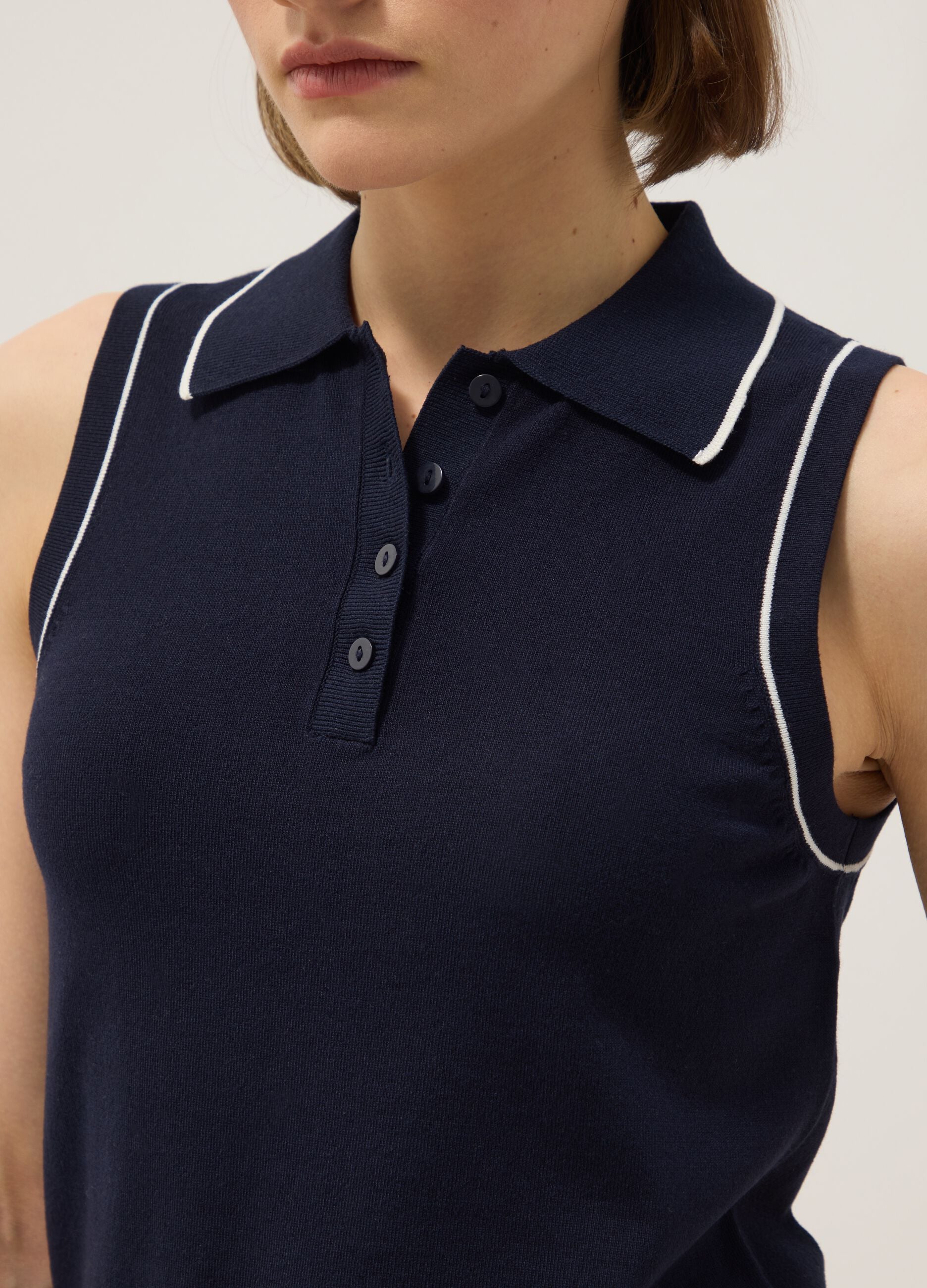Sleeveless blue viscose blend slim fit polo with buttons