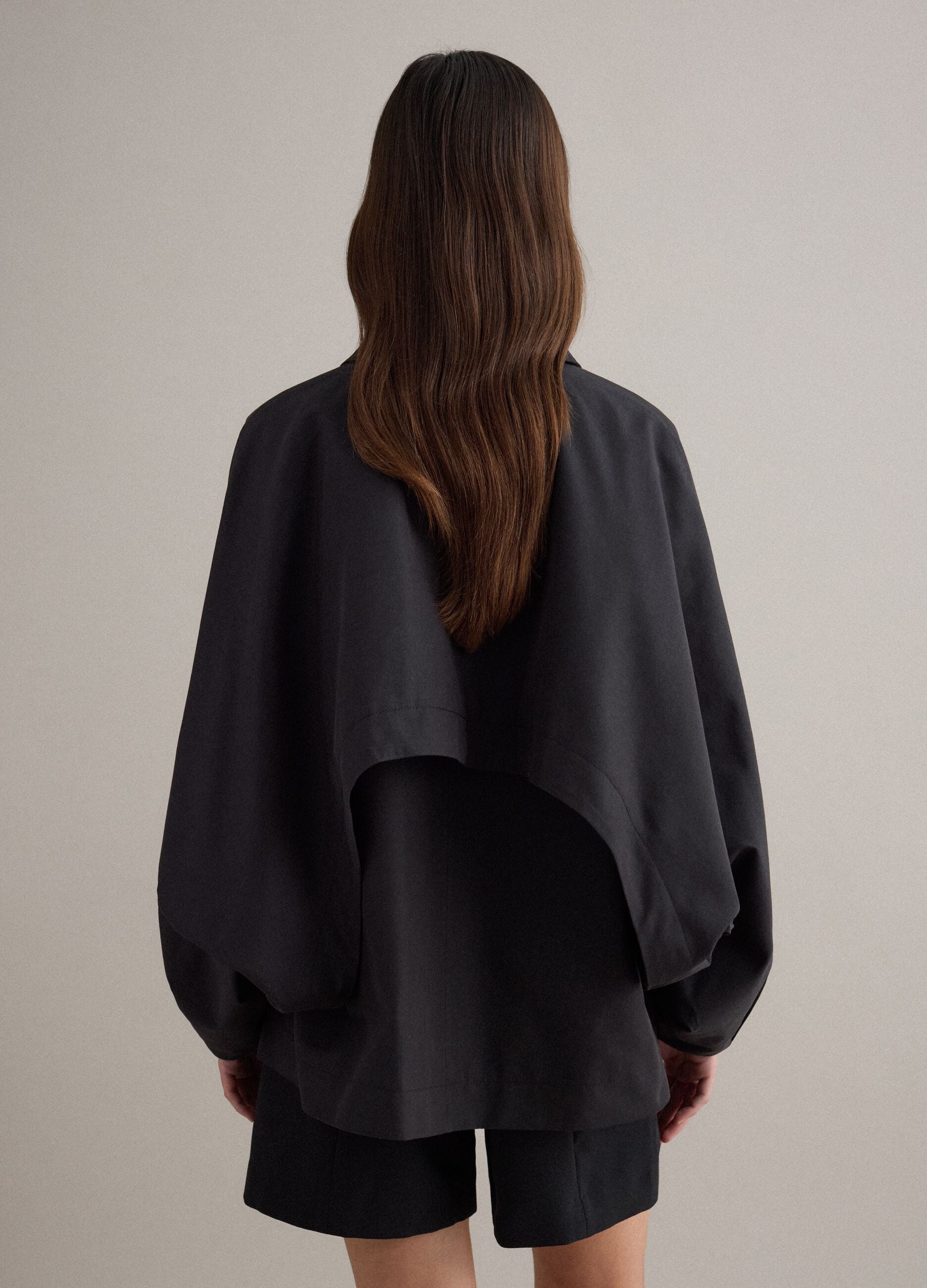 Black oversized cotton blend jacket with hidden closure