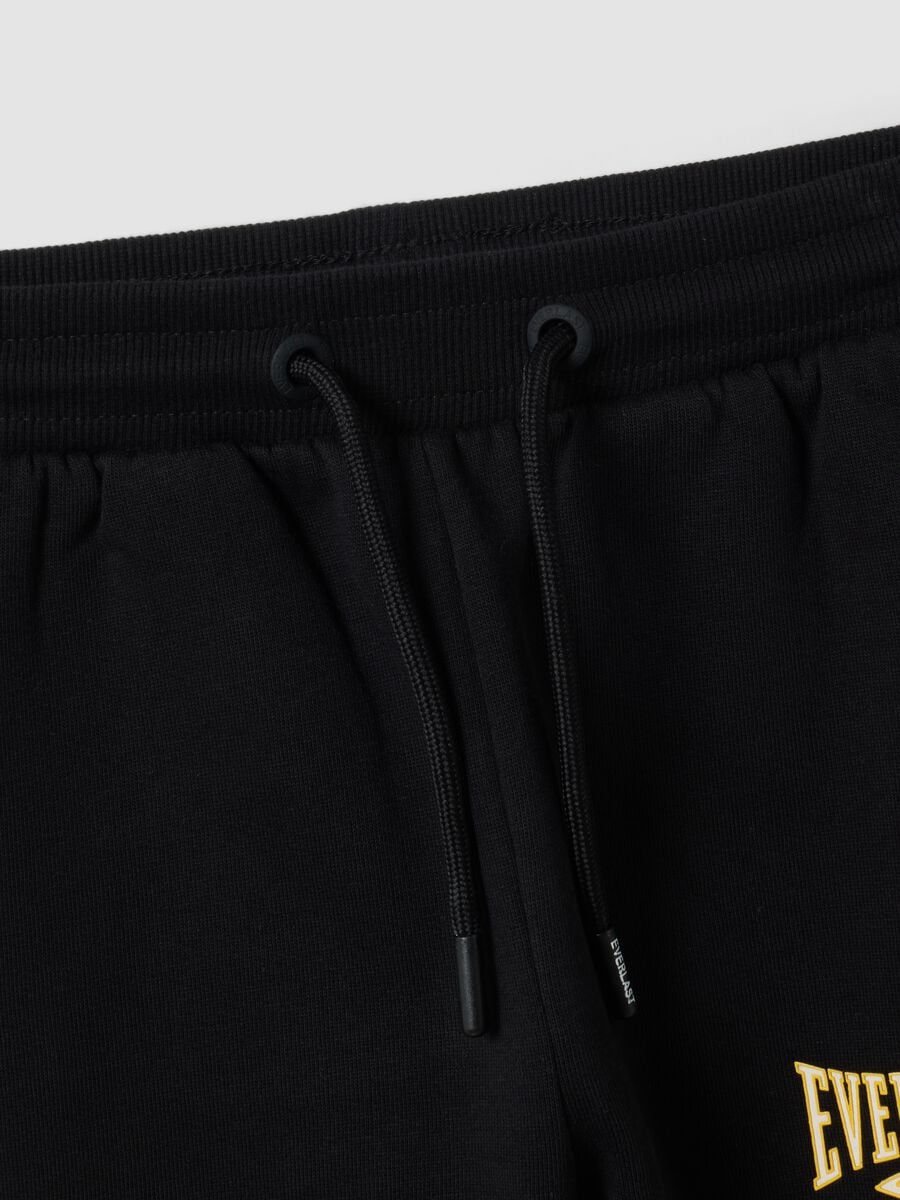 Black 100% cotton kids&rsquo; tracksuit bottoms with yellow side stripes_3