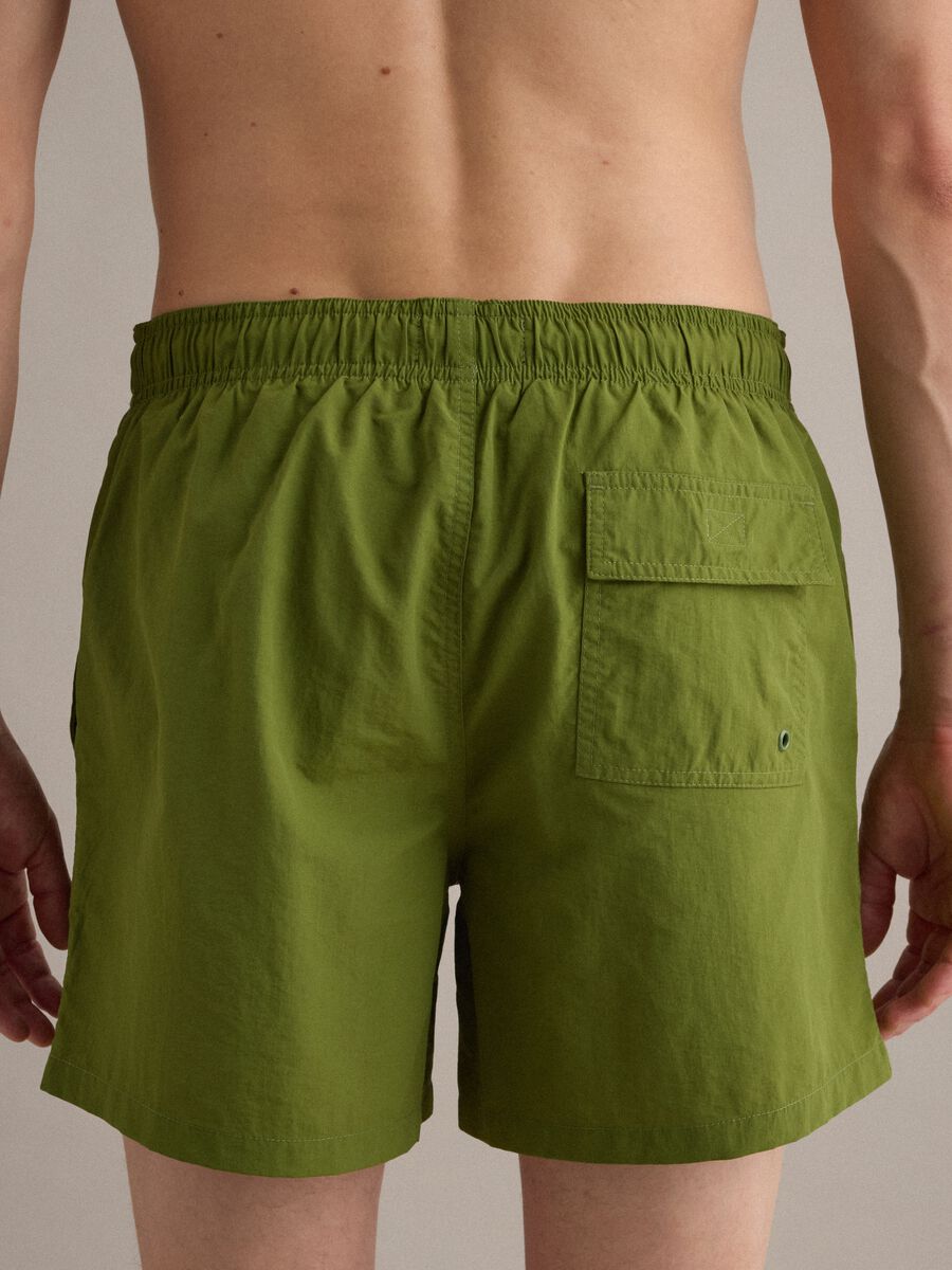 Green swim shorts with elasticated waistband and drawstring_3