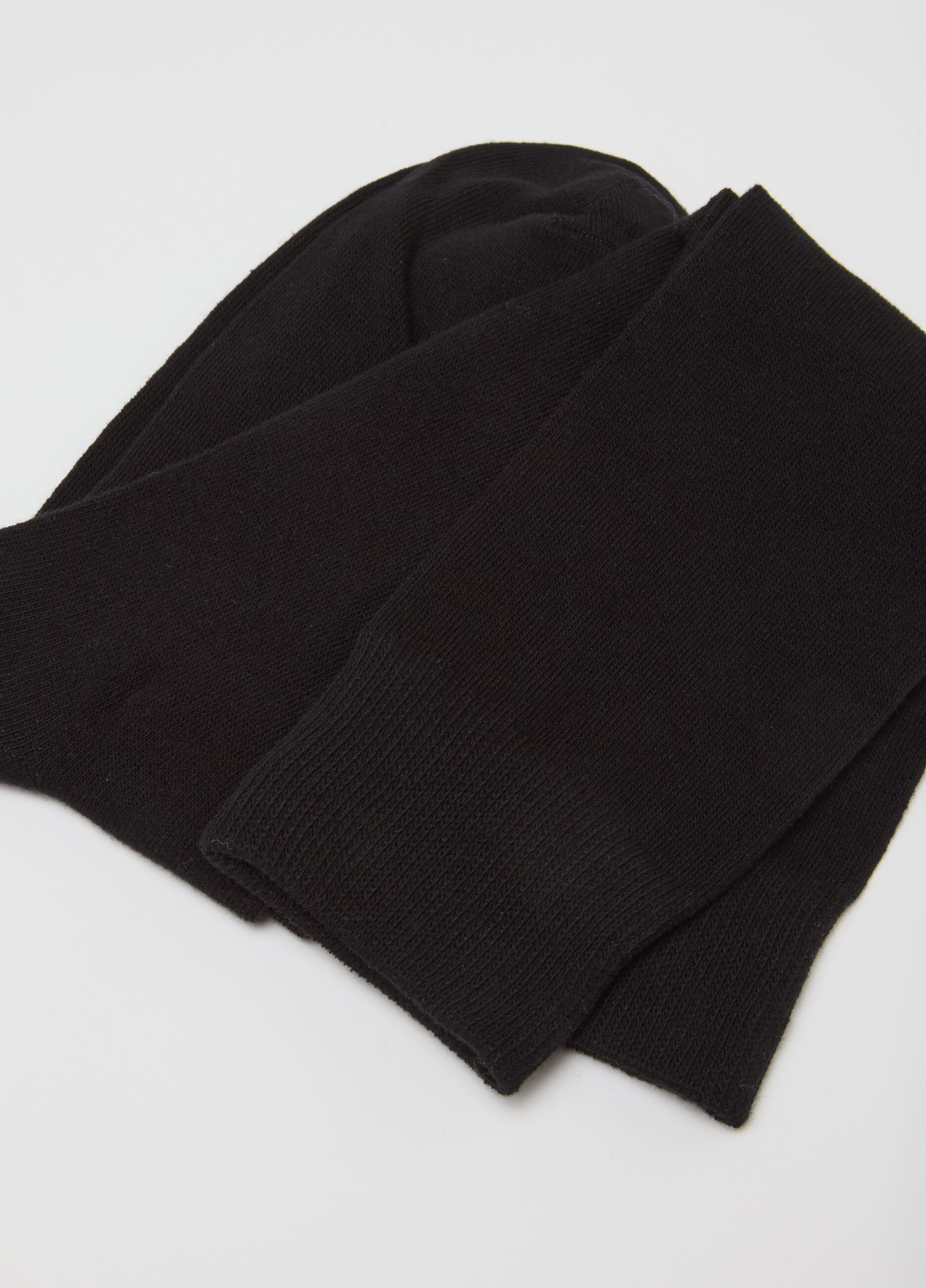 Multipack of long black socks in elasticated cotton blend