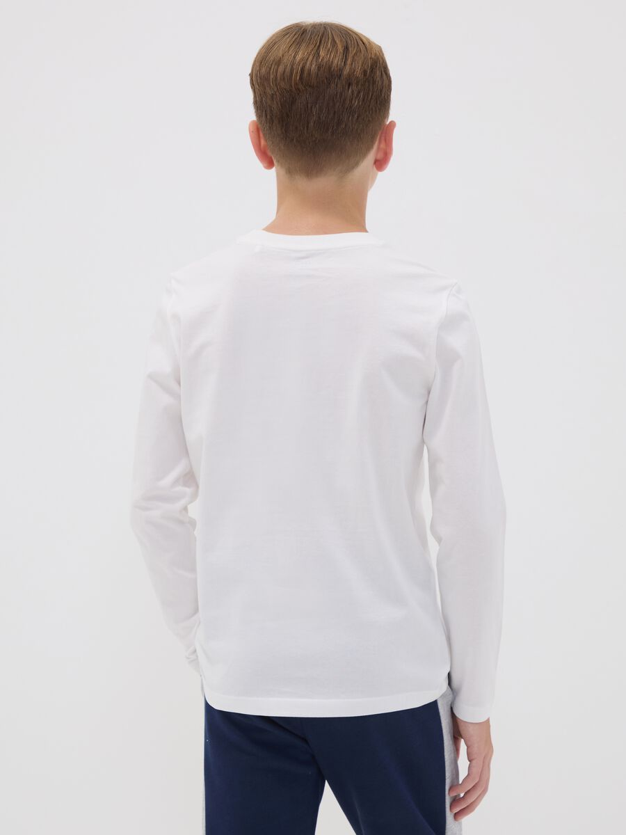 T-shirt bianca in puro cotone organico con stampa grafica per ragazzo_1
