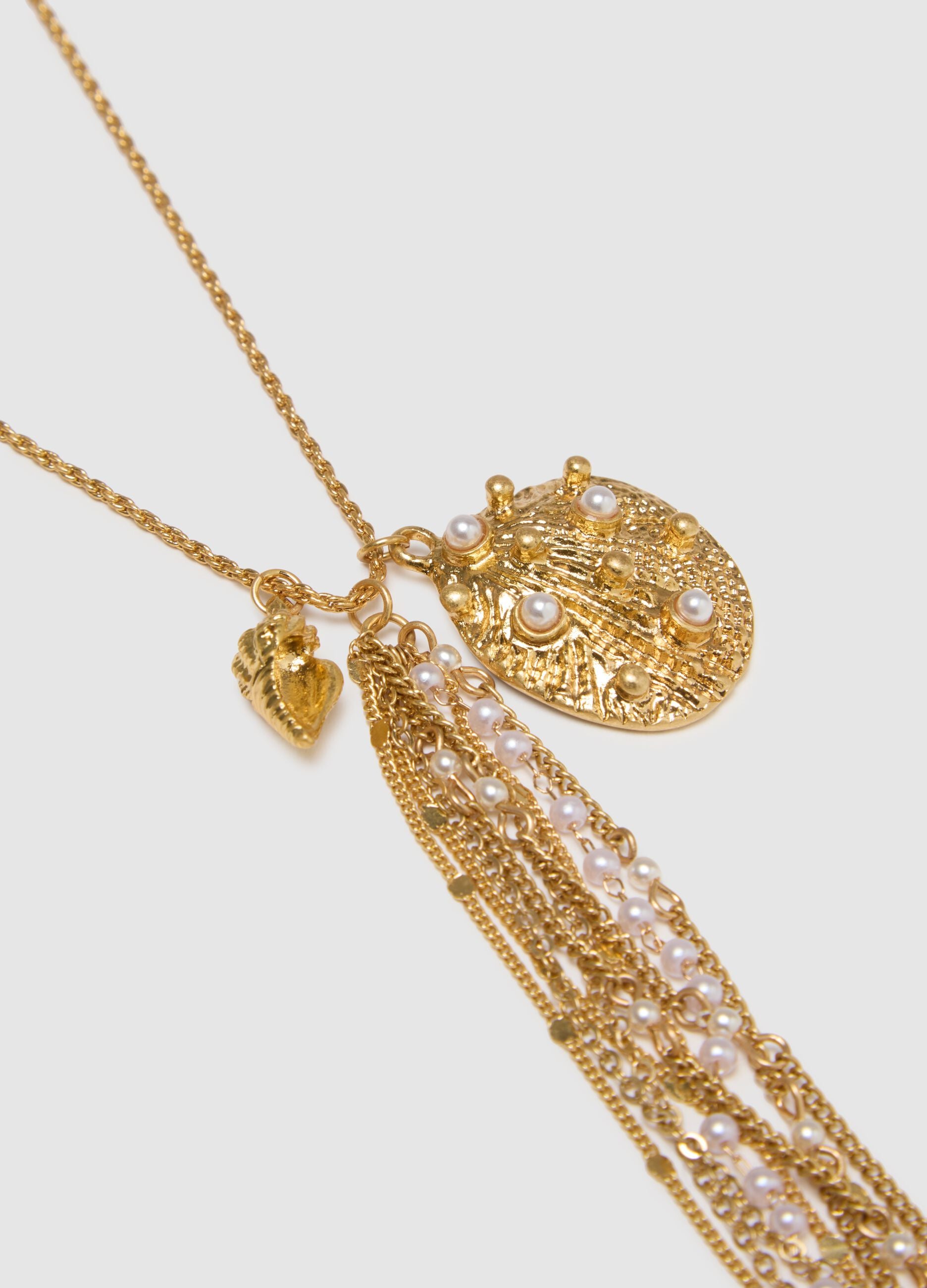 Long gold-coloured steel necklace with pendants