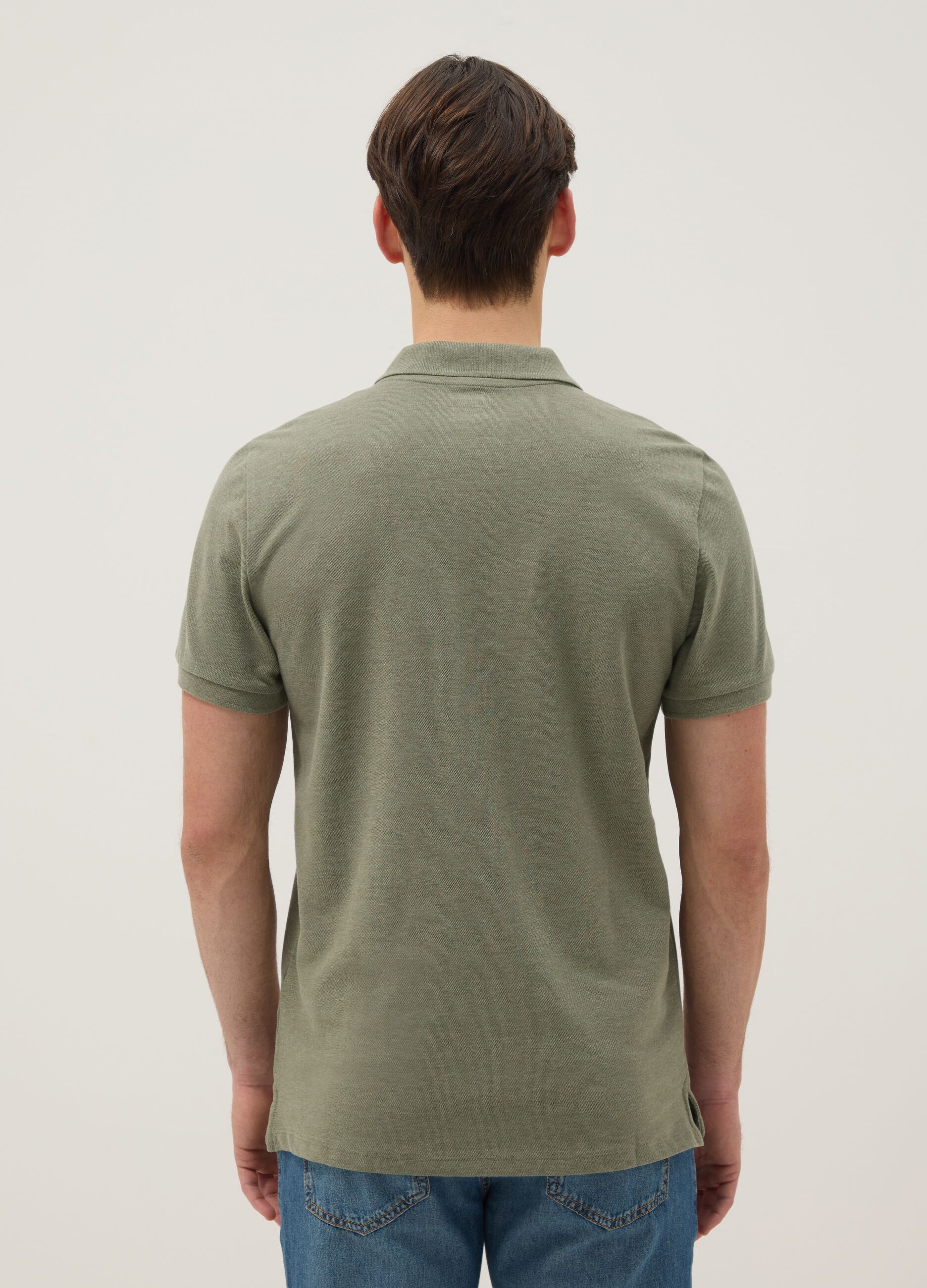 Short-sleeved green polo shirt in pure cotton