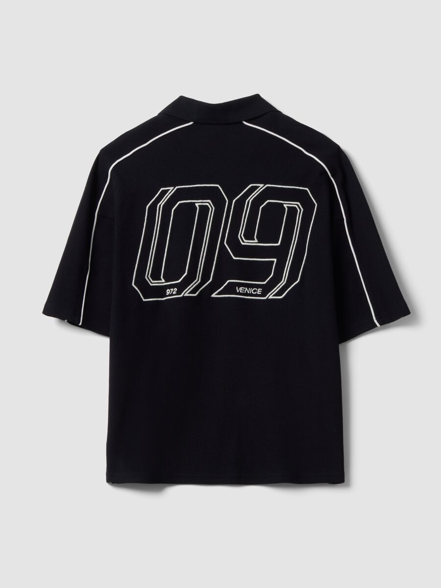 Polo nera in puro cotone over fit a maniche corte over fit_2