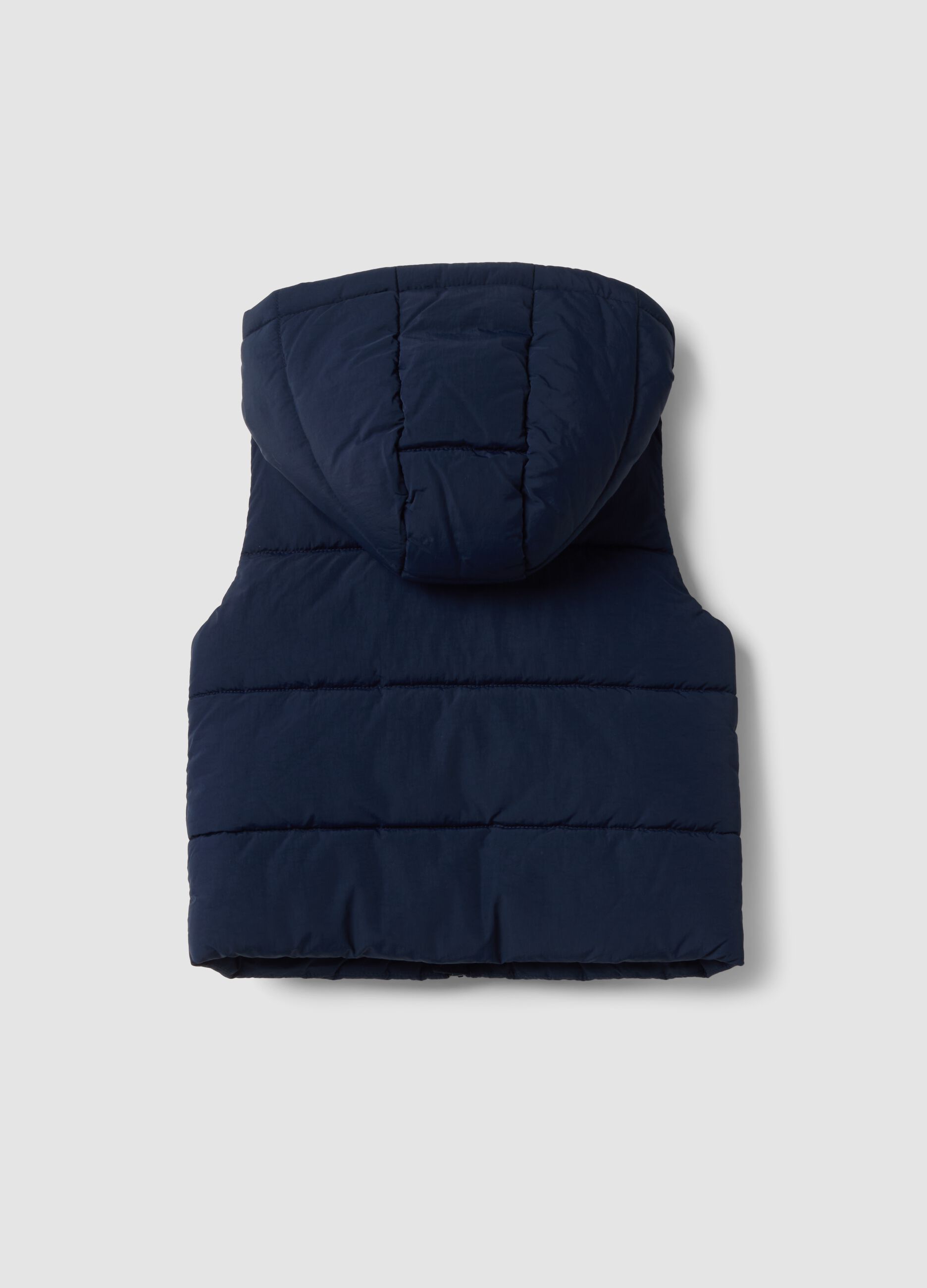 Gilet blu imbottito con cappuccio e zip per bimbo