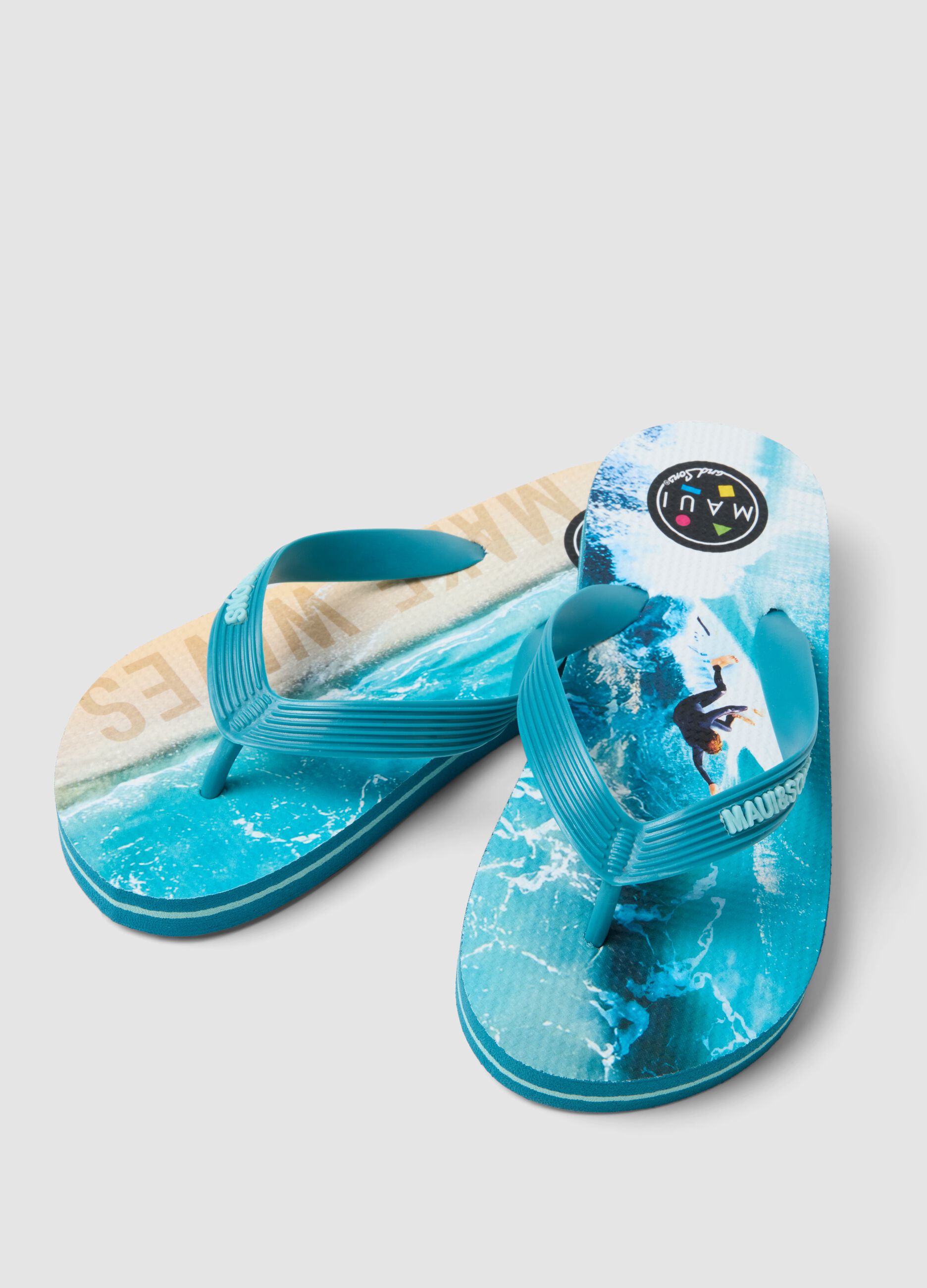 Blue and beige children's flip flops with surf design